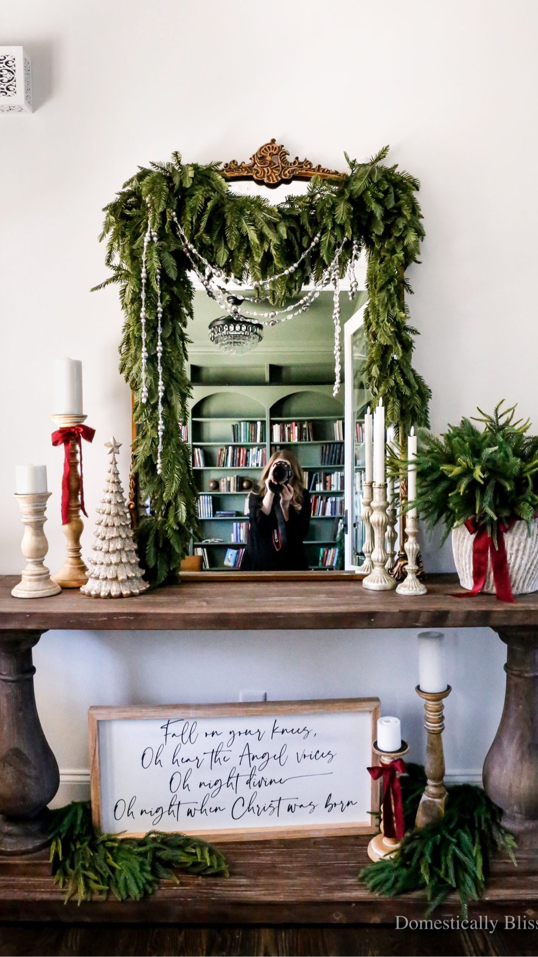 Simple Christmas Entryway Decor with a traditional red-and-green color scheme, garlands, and evergreen stems.

See details:
https://domesticallyblissful.com/christmas-entryway-2025/

🔗 Join our newsletter: https://domesticallyblissful.com/newsletter/ 

#LTKHome #LTKSeasonal #LTKHoliday