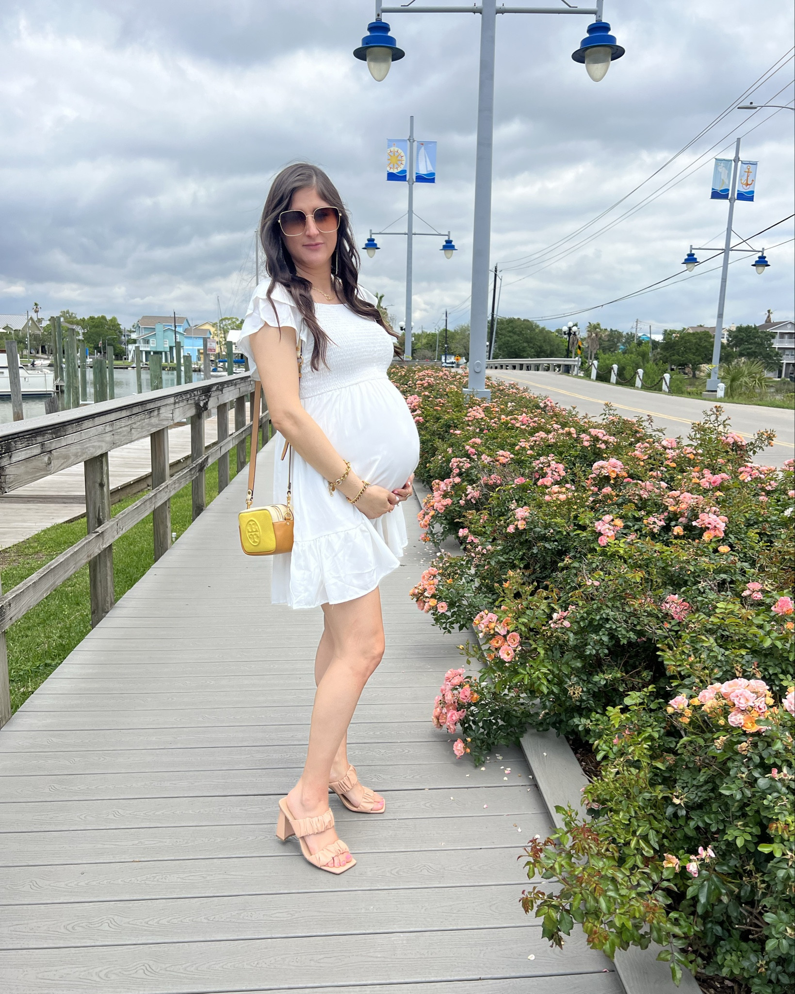 White dress. It’s not maternity but it works well with the bump and whiteout the bump. It’s lined and not see through. Cute for spring, vacation, travel outfit, and more occasions. 

#LTKSeasonal #LTKbump #LTKfindsunder50