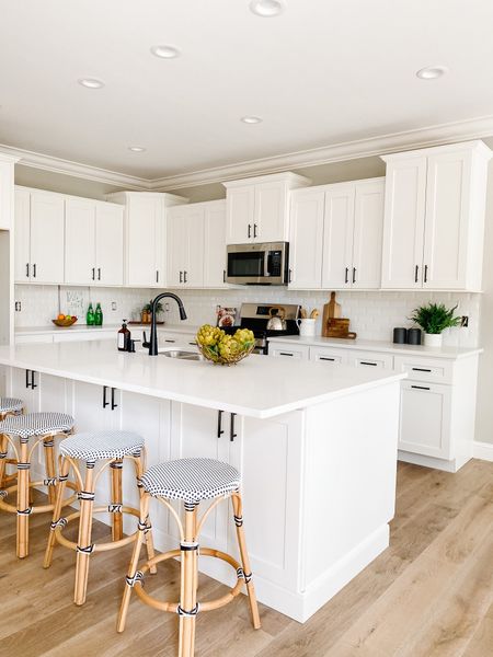These barstools add just enough contrast in this kitchen while still keeping that clean white look. 
.
.
.
Black and White Rattan Stools
Black and White Kitchen
Classic
Transitional 
Modern 
Industrial 
Light & Bright

#LTKhome #LTKstyletip #LTKunder100