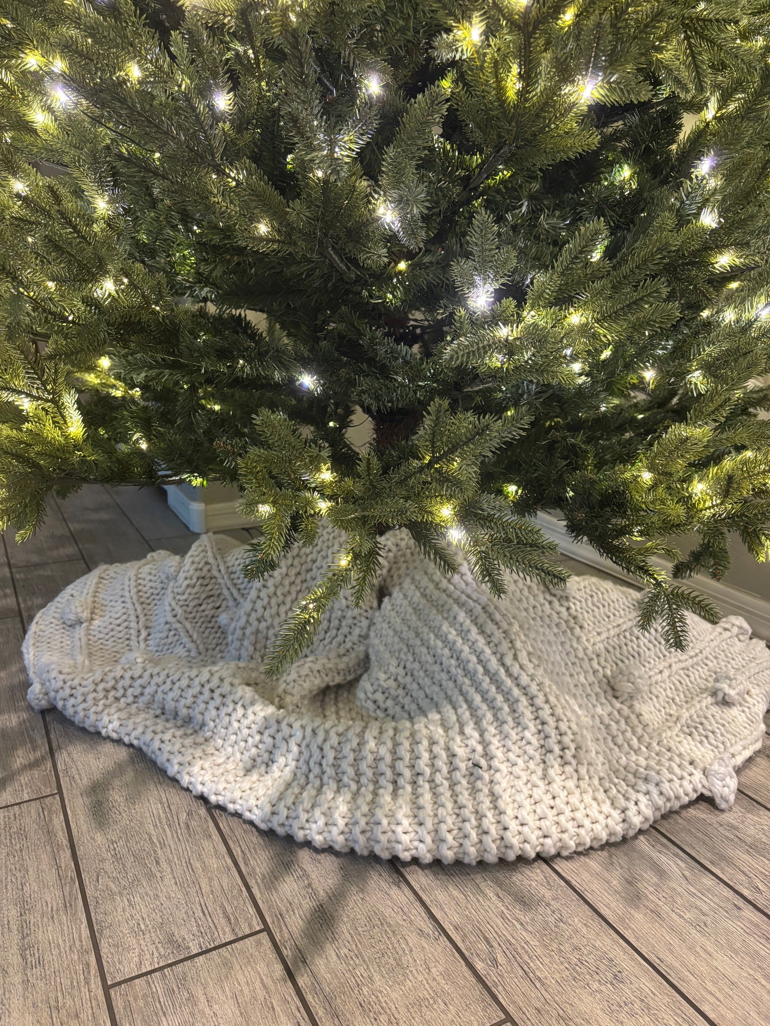 Use a throw blanket as a tree skirt! save money & use it all year 🌲 (sold in store only) linking similar 

#christmastree #treeskirt #throwblanket #potterybarn #potterybarnsale #holidaydecor #christmasviraltree #noblefirtrre #homedepot #jacksonnobletree #bestseller #viralchristmastree #christmas2025

#LTKSeasonal #LTKHome #LTKHoliday