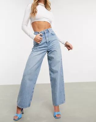 ASOS DESIGN high rise 'relaxed' dad jeans in midwash | ASOS (Global)