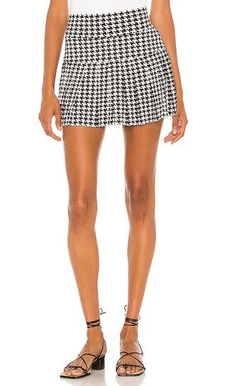 Pleated Mini Skirt in Large Check | Revolve Clothing (Global)