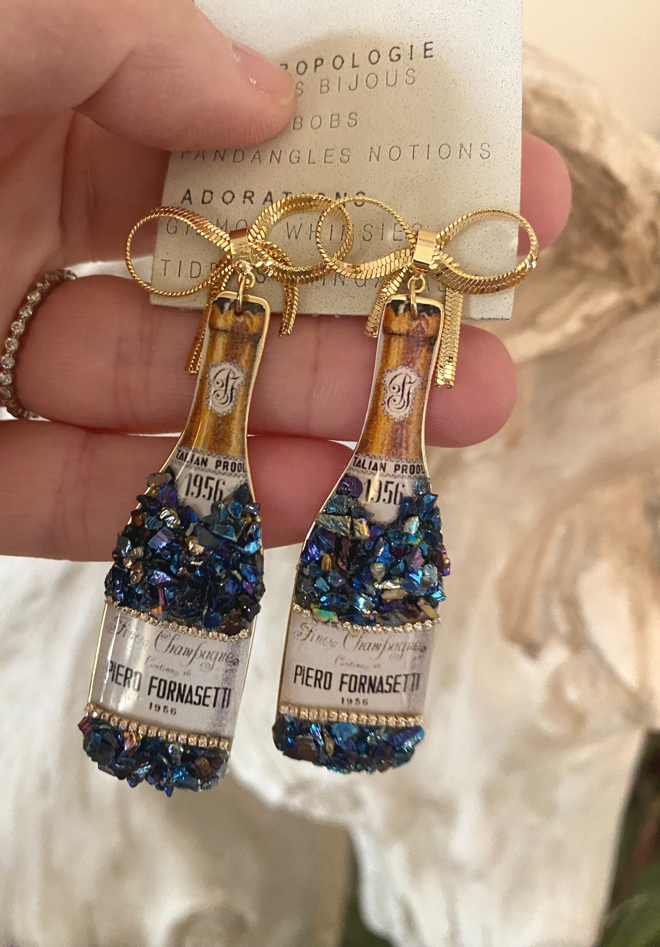 Fun cocktail earrings
Anthropologie 
Gifts for her
Holiday party 

#LTKHoliday