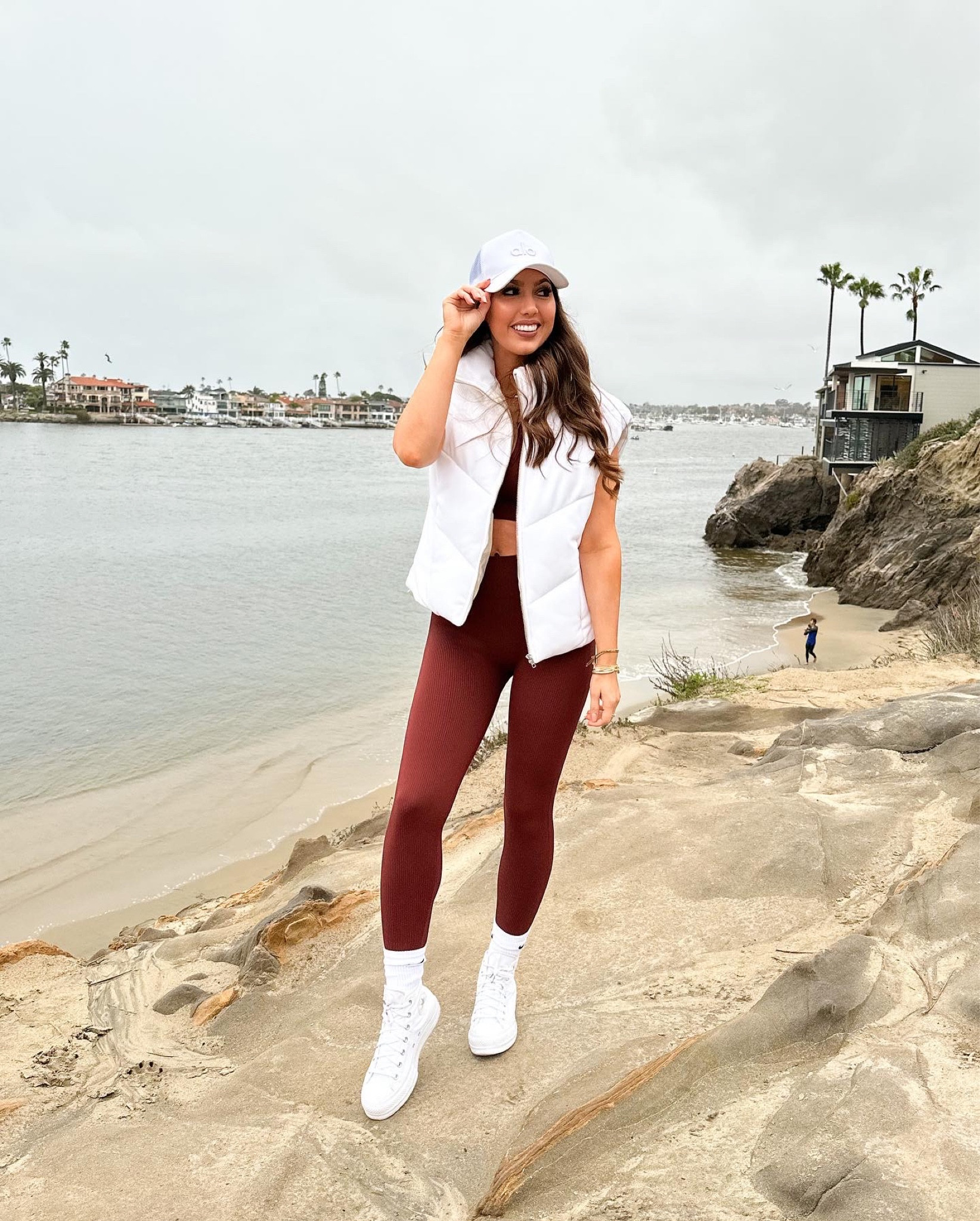 Cute athleisure outfit! 🤍 

White vest, vest outfit, workout outfit, converse high tops, white high tops, my styled life, white hat, alo hat, alo vest, alo yoga

#LTKfit