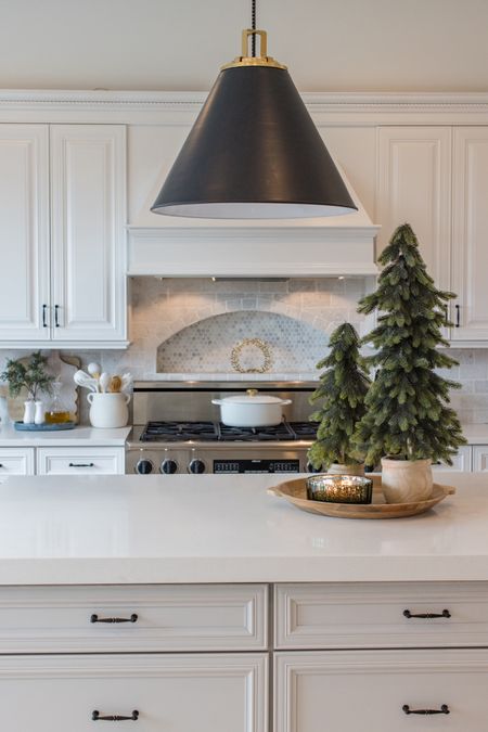 Holiday kitchen views! Love our black pendant lights! 