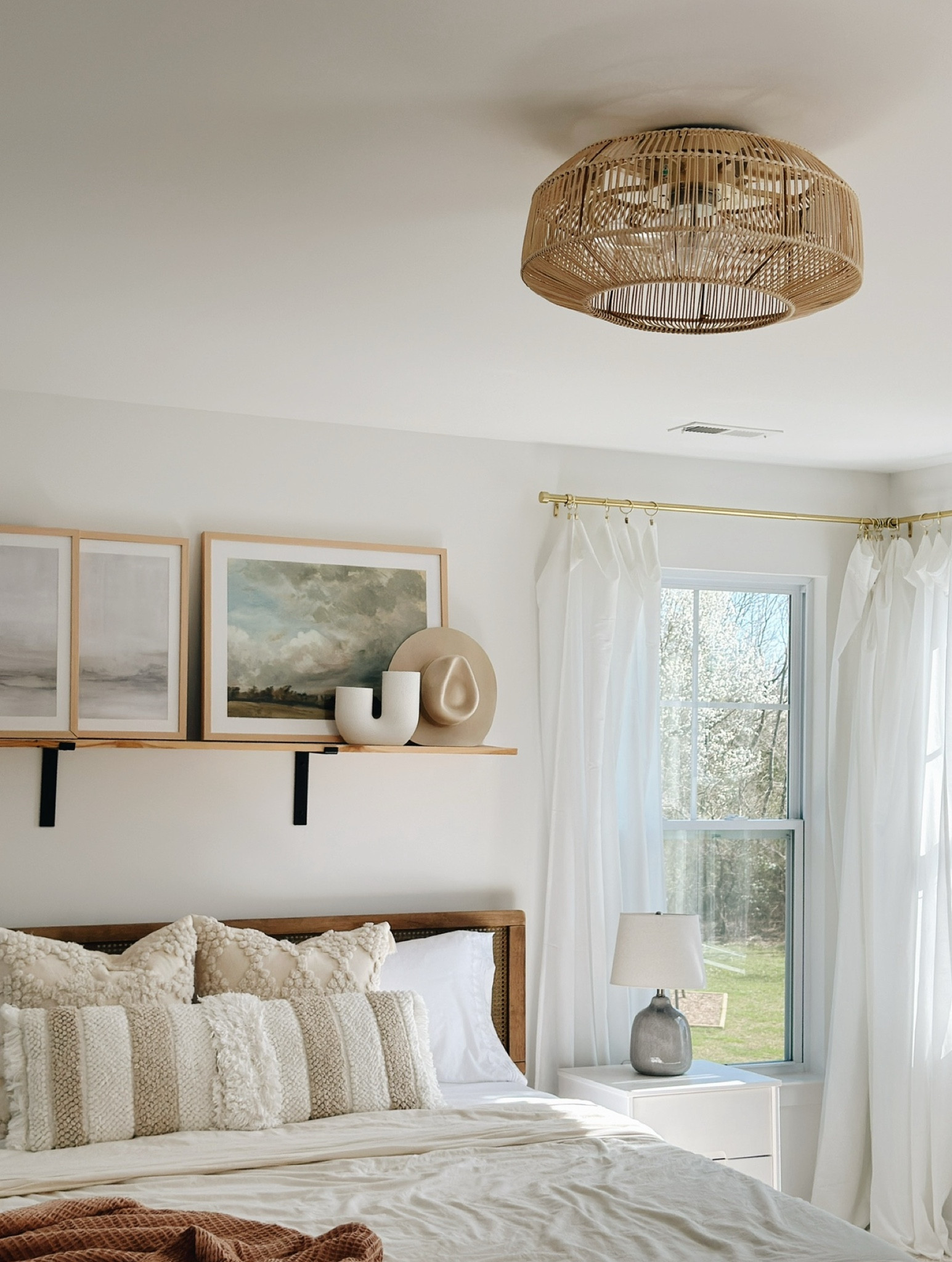 Not your typical ceiling fan! We love this rattan ceiling fan + light in our master bedroom. 

#LTKHome
