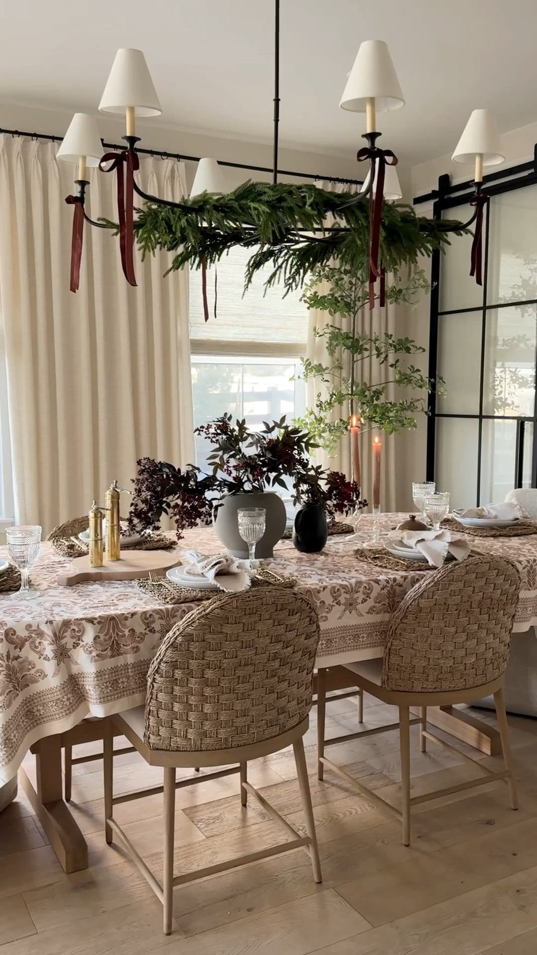 Holiday table scape. I love using viral Norfolk garland in an unexpected way 

#LTKSeasonal #LTKVideo #LTKHome