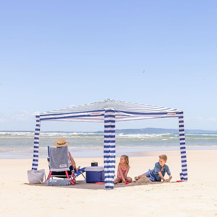 CoolCabana Beach Shade Tent - Easy Setup, UPF 50+ Protection, Large & Medium Sizes, Compact & Win... | Amazon (US)