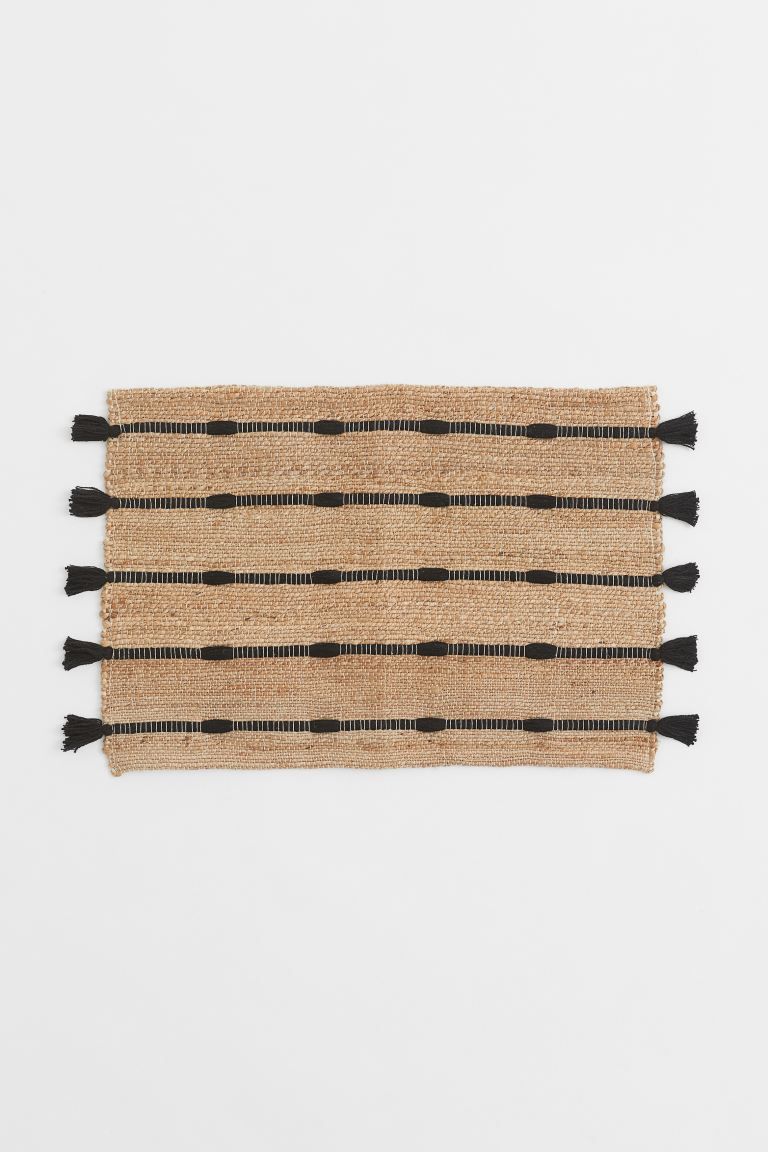 Bath mat in braided jute with contrasting stripes in woven cotton fabric. Large tassels at short ... | H&M (US)