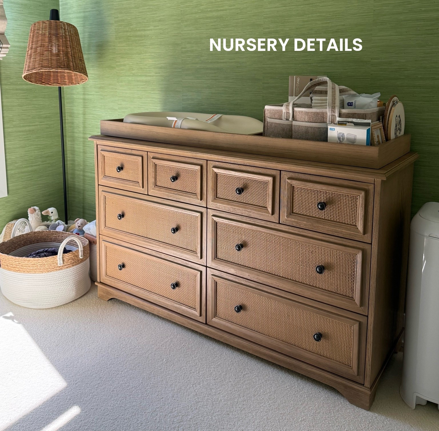 Sharing all the details from baby Bobby’s nursery🦒✨🤍 

• Drawer and changing table is from pottery barn (Fillmore 8-Drawer Changing Table in seadrift and natural cane) paired with Keekaroo Peanut changer 
• Floor lamp is a few seasons ago from Anthropologie, linking similar! 
• Bookshelf is 36” floating wood shelf from Target in natural wood colorway 
• Roman shades are from Pepper home - Margot Fern without tassel trim included
• Nursery glider is from Nestig (The Drift Glider Recliner Nestig x Zoë Feldman) in blue mini meadow, unfortunately not linkable! We have another nursery glider in our master bedroom from @oilostudio, linking that as well! 
• Crib is from Nestig as well (The wave crib in natural wood) linking similar options! ￼ 
• Carpet is custom from Home Depot linking exact 
• Hanging lamp came with the house, but found the same (if not very similar!) on crate and barrel kids

#LTKBaby #LTKHome #LTKmomlife