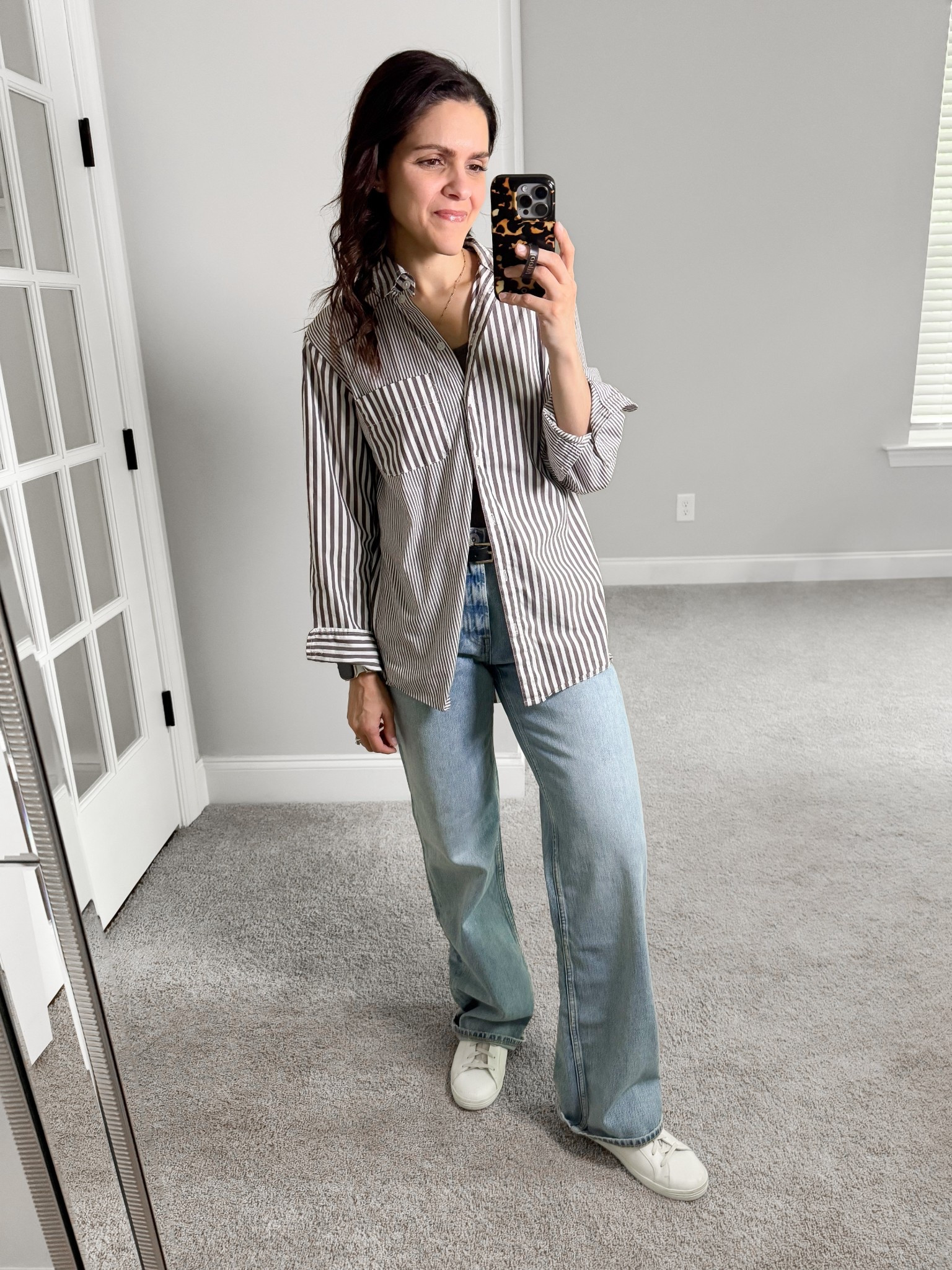 What I wore:
Striped button up: old from Target, linked similar
90s jeans: Everlane, sized up one for a relaxed fit 
Sneakers: Freda Salvador, tts

#LTKStyleTip