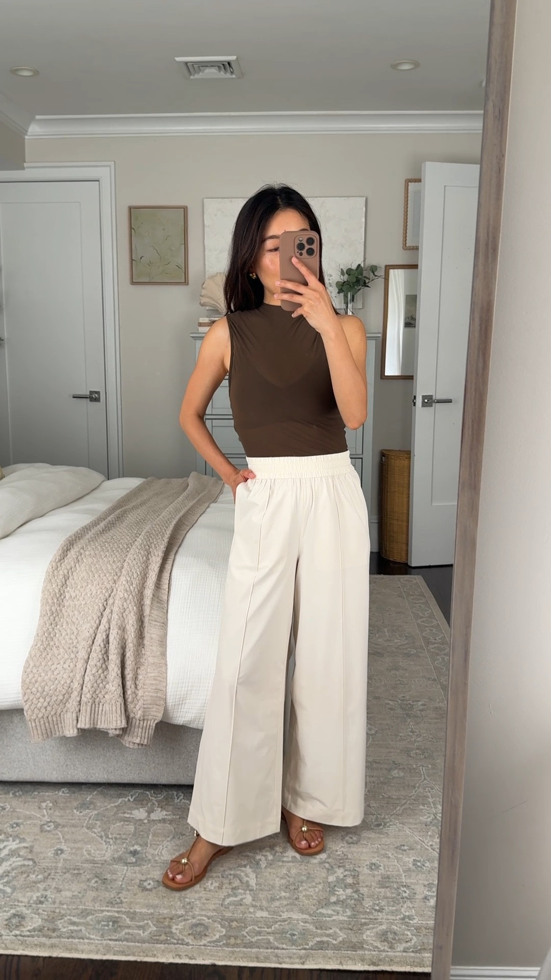 Sizing info below!
• Breezily wide leg pant xxs in the 25” crop length - TTS, 11” high rise, 12.25” across waist. Very airy, machine washable. 

Ivory and taupe are double layered, stripes and the other colors are single layer. The ivory shows a little creasing after prolonged sitting but the stripe and darker colors do not at all. 
• tank top xs - 2 pieces that include a sports bra and mesh overlay.

#ad @lululemon #lululemoncreator busy mom style, petite friendly airport travel pants, athleisure

#LTKPetite #LTKTravel #LTKmomlife