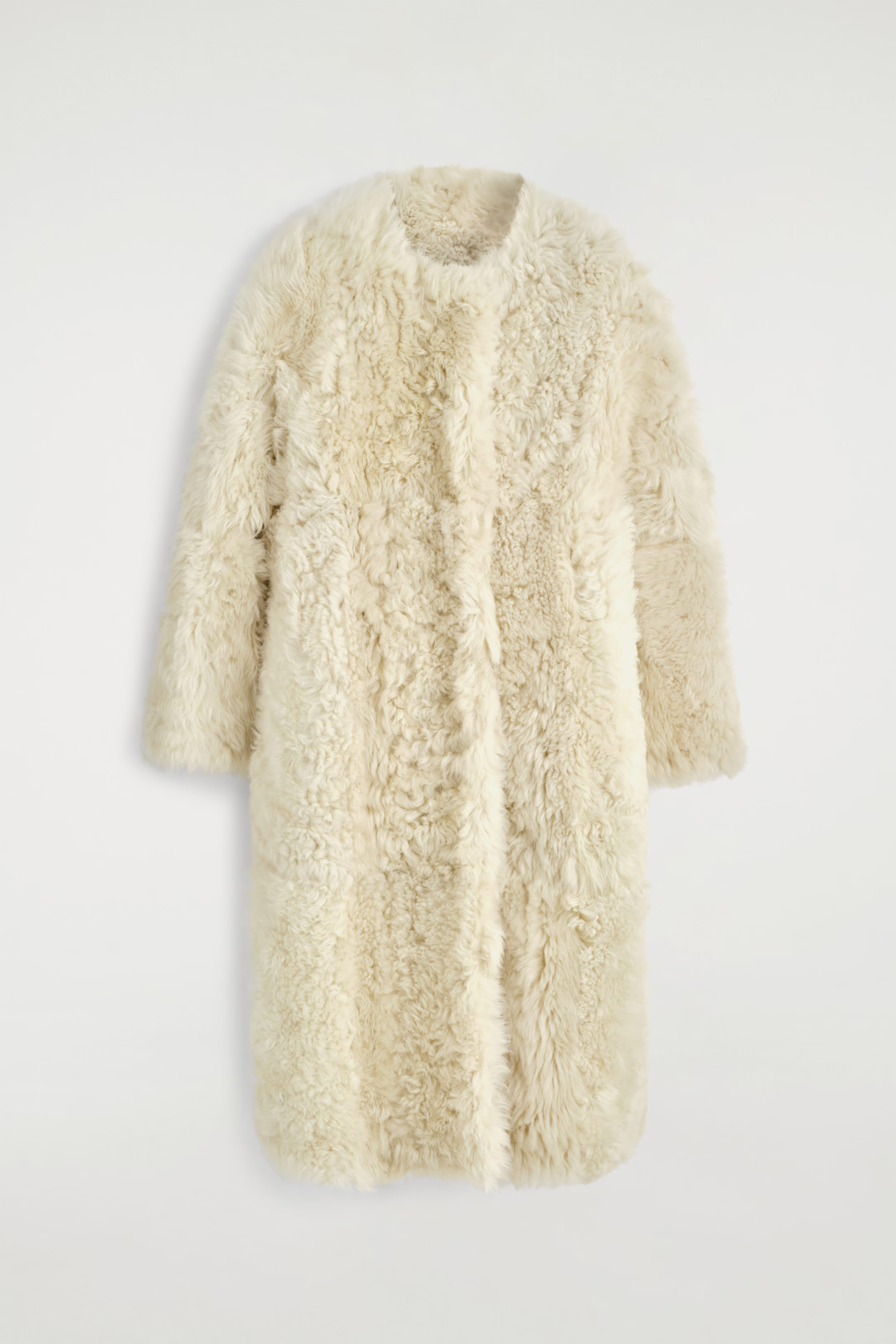 COLLARLESS SHEARLING COAT - CREAM | COS GB | COS UK