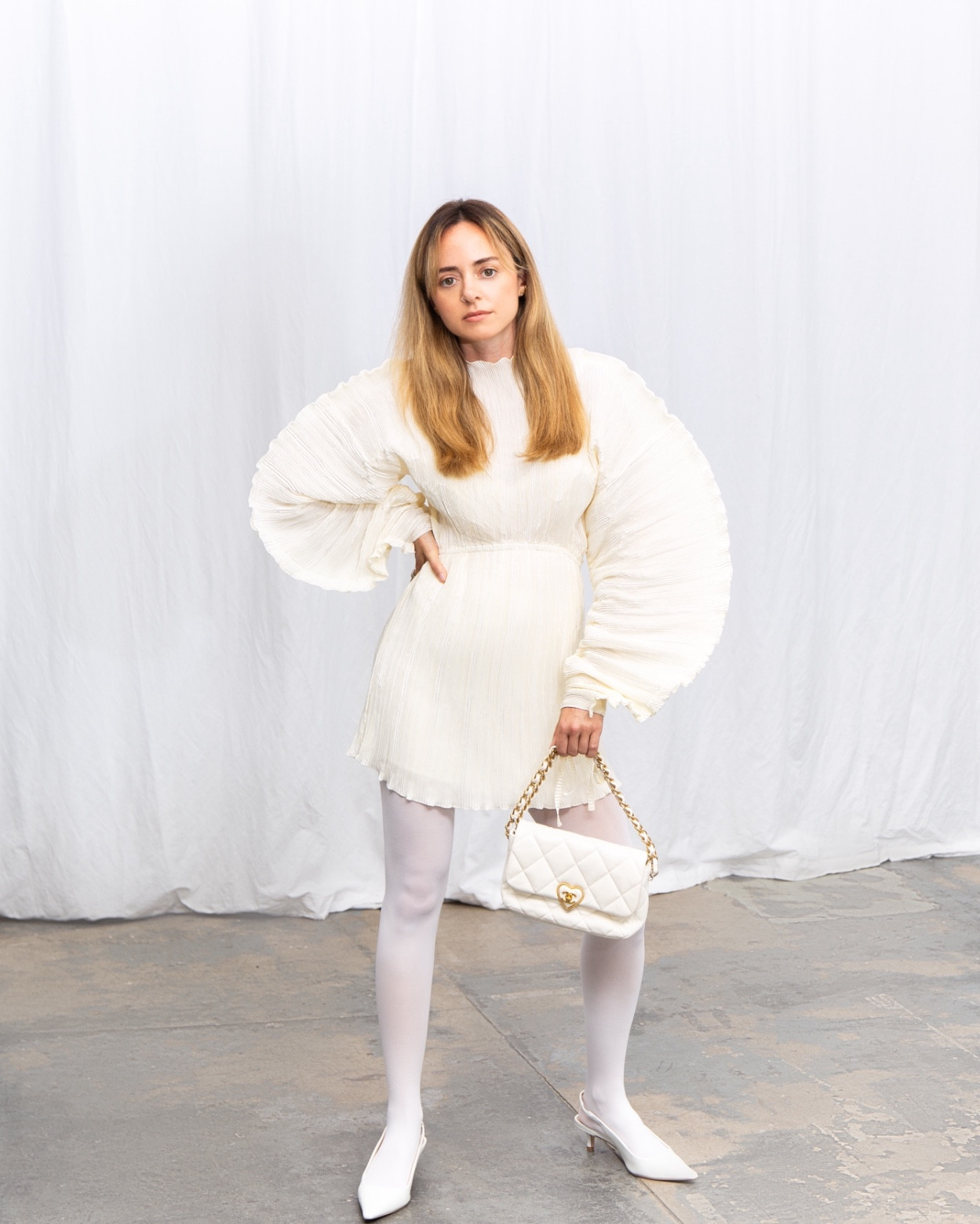 Inspired by Emily in Paris, this all white outfit is chic and can be worn year round. I am loving the shapes of these sleeves, adding a unique touch to this slinky mini dress. Perfect for a date night, a bride to be wedding activity look, or a stroll in Paris of course! 

#emilyinparis

#LTKStyleTip #LTKParties #LTKWedding