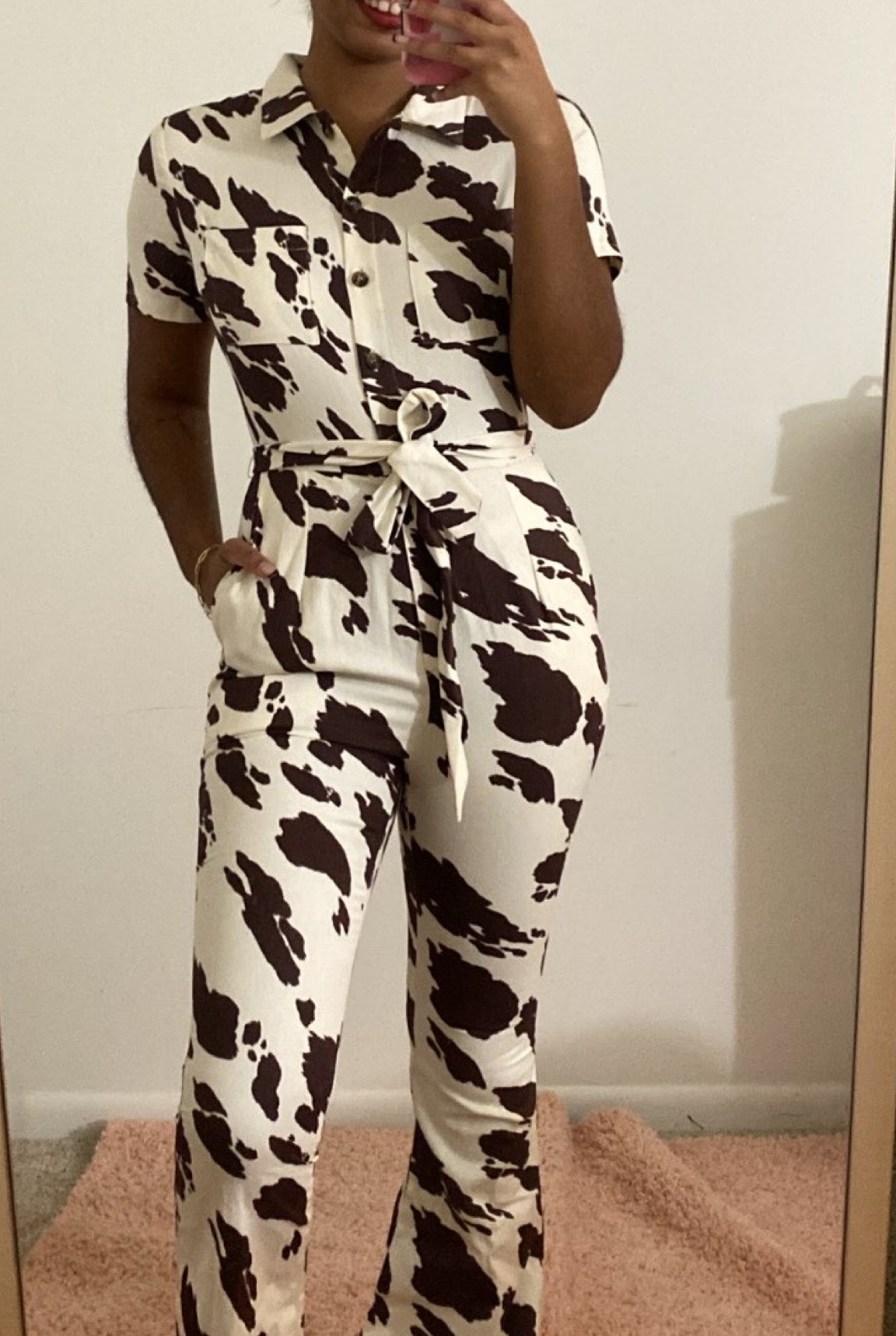 Cutest cowprint jumpsuit/ boilersuit 

#LTKsalealert #LTKSeasonal #LTKfindsunder100