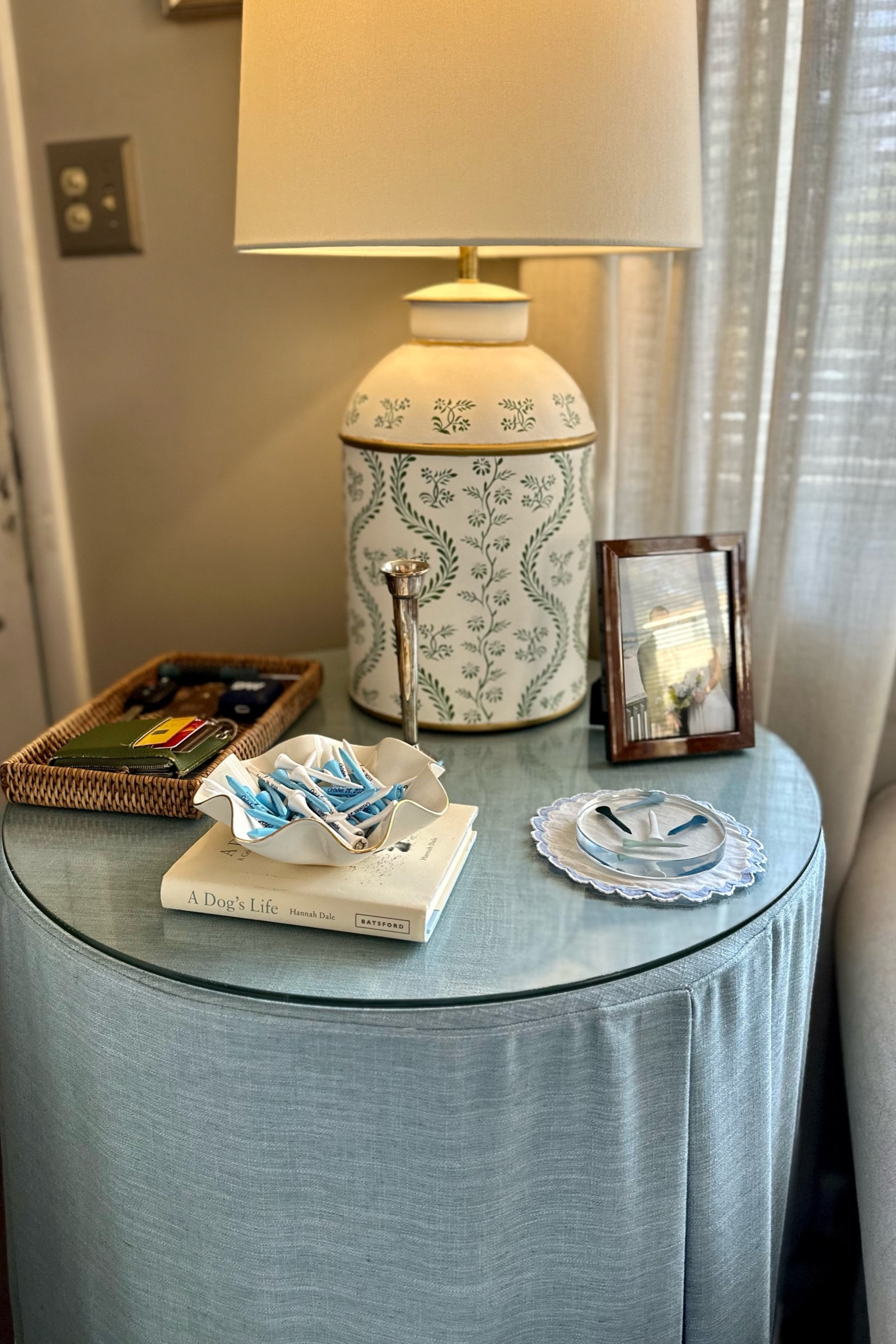 Living room skirted tablecloth was custom made for our wedding on Etsy. I’ve linked the seller and they are so great to work with and the tablecloth can be made in different shapes and colors. What is shown on the table is also linked! 

Our living room so far feels pretty finished, but there are still some updates I’d like to make! Here’s a look at how it looks now to give you an idea of the space we’re working with and the different vignettes set up in the room!

First house, living room, blue and green decor, southern traditional, antique furniture, smaximalist, southern maximalism, affordable home decor, interior design hack, cane furniture, faux bamboo furniture, ikea sofa, skirted table, unique lamp, green and white lamp, gold tee, golf tee coasters

#LTKfindsunder100 #LTKhome
