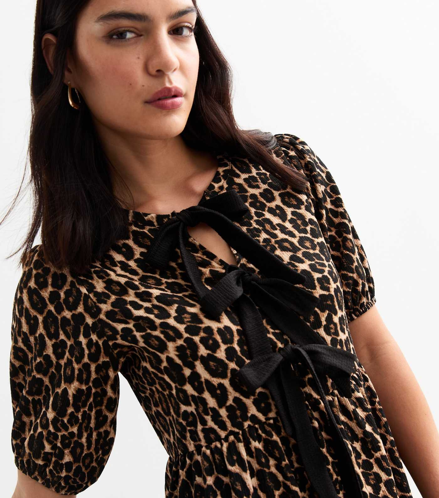 Brown Leopard Print Tie Detail Puff Sleeve Crinkled Midi Dress
						
						Add to Saved Items
		... | New Look (UK)