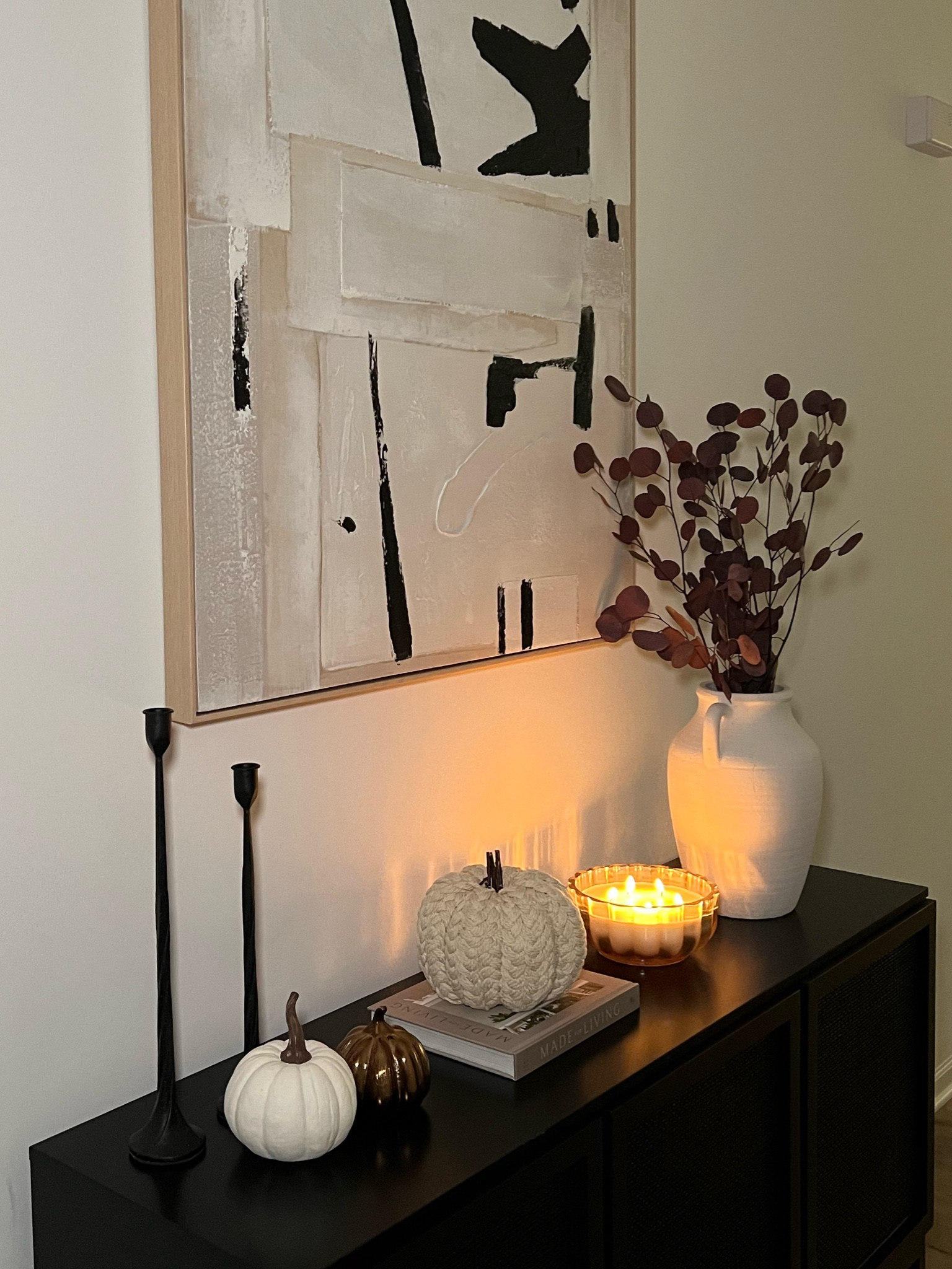 Fall foyer decor 🍁

Pumpkins, vase and stems from hobby lobby. Photo from Ross. 