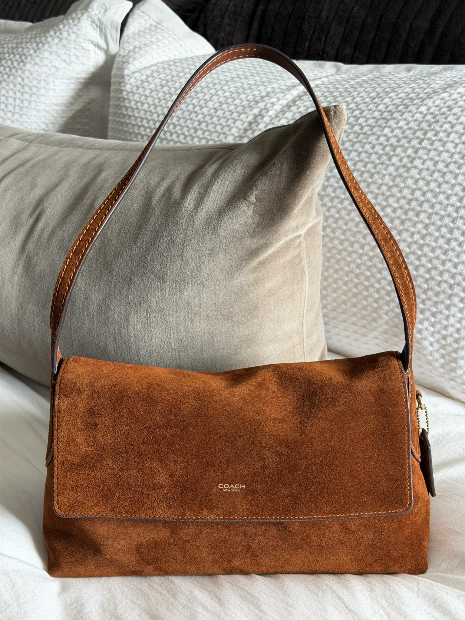 The prettiest bag I’ve ever seen and perfect for Fall!🍂 This is the Chelsea 30 in suede and is the perfect everyday bag. Holds the right amount, doesn’t slip off the shoulder, goes with everything. Just spray with suede water protectant before carrying to protect the bag. And it’s back in stock if you’ve had you’re 👀 on her get her before she sells out again! She’s gorgeous!🤩 #coach #chelsea30 #suede

#LTKdayinmylife #LTKmomlife #LTKootd