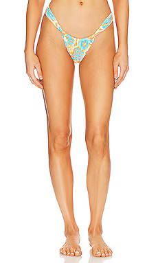 Kulani Kinis Ruched Bikini Bottom in Miami Moon from Revolve.com | Revolve Clothing (Global)