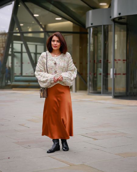 Brown Chunky Cardigan Brown Golden Satin Midi Skirt Black Knee High Boots Simple autumnal outfit Transitional outfit Autumn looks Fall outfit Winter OutfitPetite Style Guide Petite Fashion

#LTKSeasonal #LTKeurope #LTKstyletip