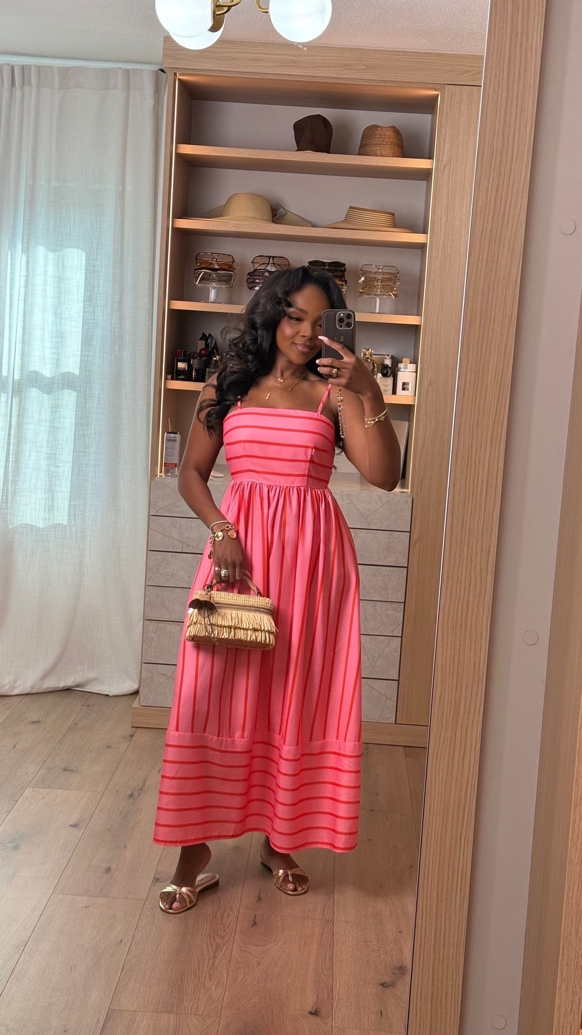 Hi Babes!

This pink striped midi dress is SUCH a happy summer dress and the fit is honestly so flattering. The brighter pink tone with the subtle stripe detail gives that playful feminine vibe without feeling too overdone, and the fuller skirt makes it feel super elevated and expensive. Paired it with a woven mini bag and simple sandals for that effortless vacation look.

The bodice fits really nicely on a fuller chest while still cinching the waist in perfectly, and the flowy skirt gives movement without adding bulk. Lightweight, breathable, and one of those dresses that instantly makes you feel pretty the second you put it on.

Where to wear this:
• Vacation dinners or resort brunches
• Baby showers or bridal events
• Summer markets or girls brunch
• Beach vacations or tropical getaways
• Casual summer date nights

Undergarments: nude seamless underwear and either a strapless bra or nipple covers depending on your comfort level (linked).

Everything is linked below

xx Kira | IG: KirasFashionFinds

34D - 27 - 40 • Size Small or 4

#LTKgrwm #LTKootd #LTKPetite
