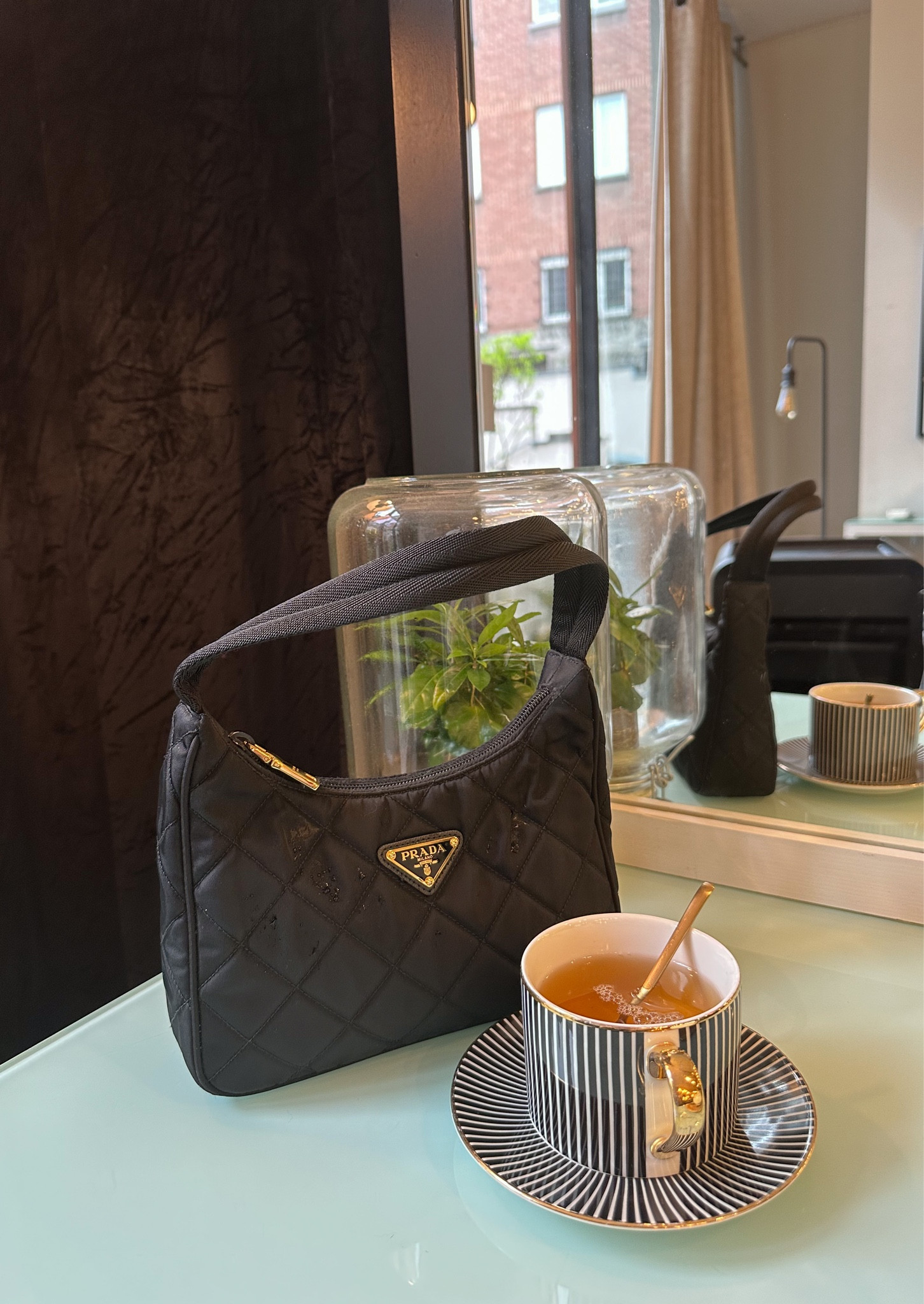 Prada or Nada 

#LTKeurope #LTKstyletip #LTKitbag