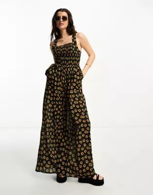 ASOS DESIGN shirred pinafore jumpsuit in sunflower print | ASOS (Global)
