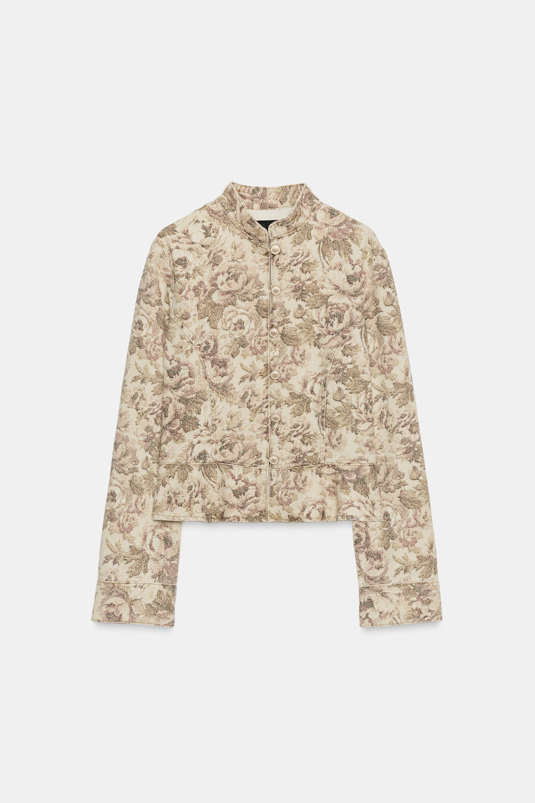 Model height: 178 cmCropped jacket featuring a high collar, long sleeves, an A-line hem and front... | Zara NL