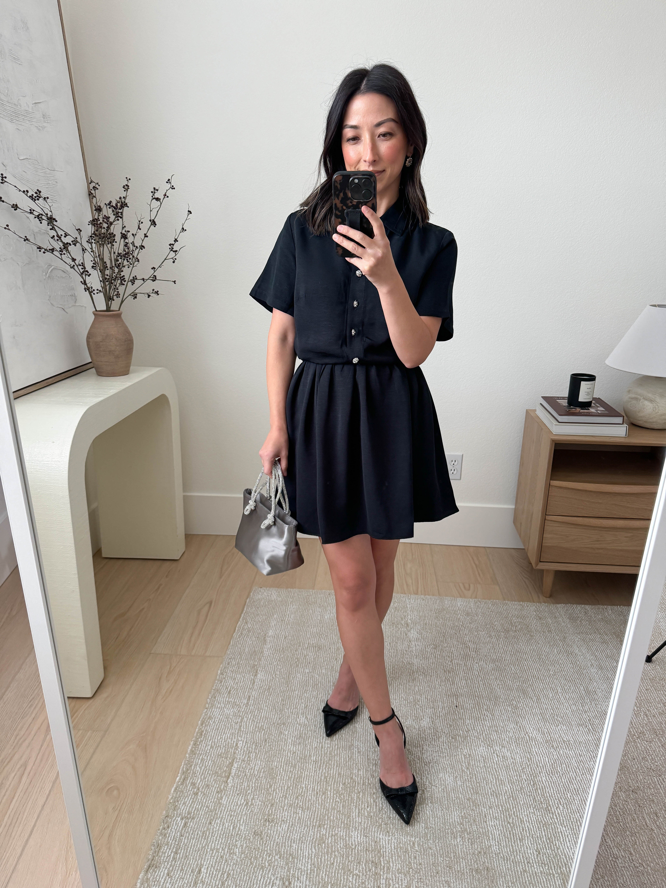 J.Crew festive black shirtdress. Runs a tad long on me at 5ft so I have it belted to pull up some of the fabric. Buttons popped off, but other than that, this dress is super pretty and understated. 

J.Crew dress small, but could have gone tts
J.Crew heels 5
J.Crew mini bag
J.Crew earrings

#LTKCyberWeek #LTKSaleAlert #LTKHoliday