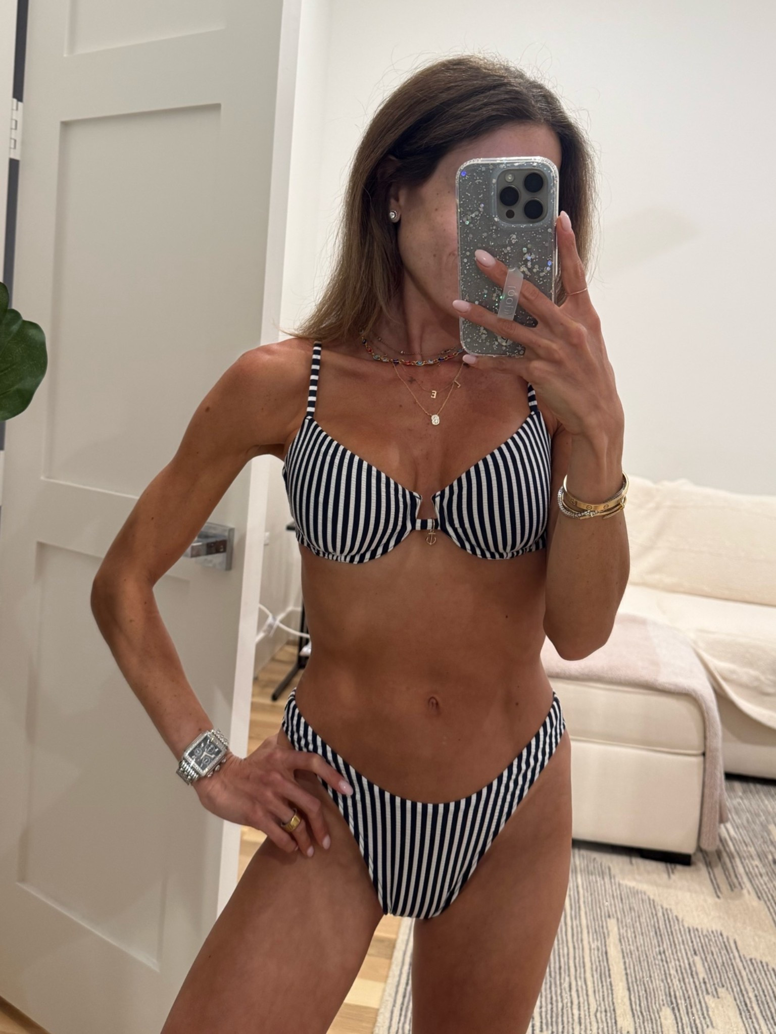 Navy and white stripe bikini with underwire and cute anchor charm. Wearing xxs bottoms, size s top. 

Code SHORTSAF

#LTKPetite #LTKSwim #LTKSaleAlert
