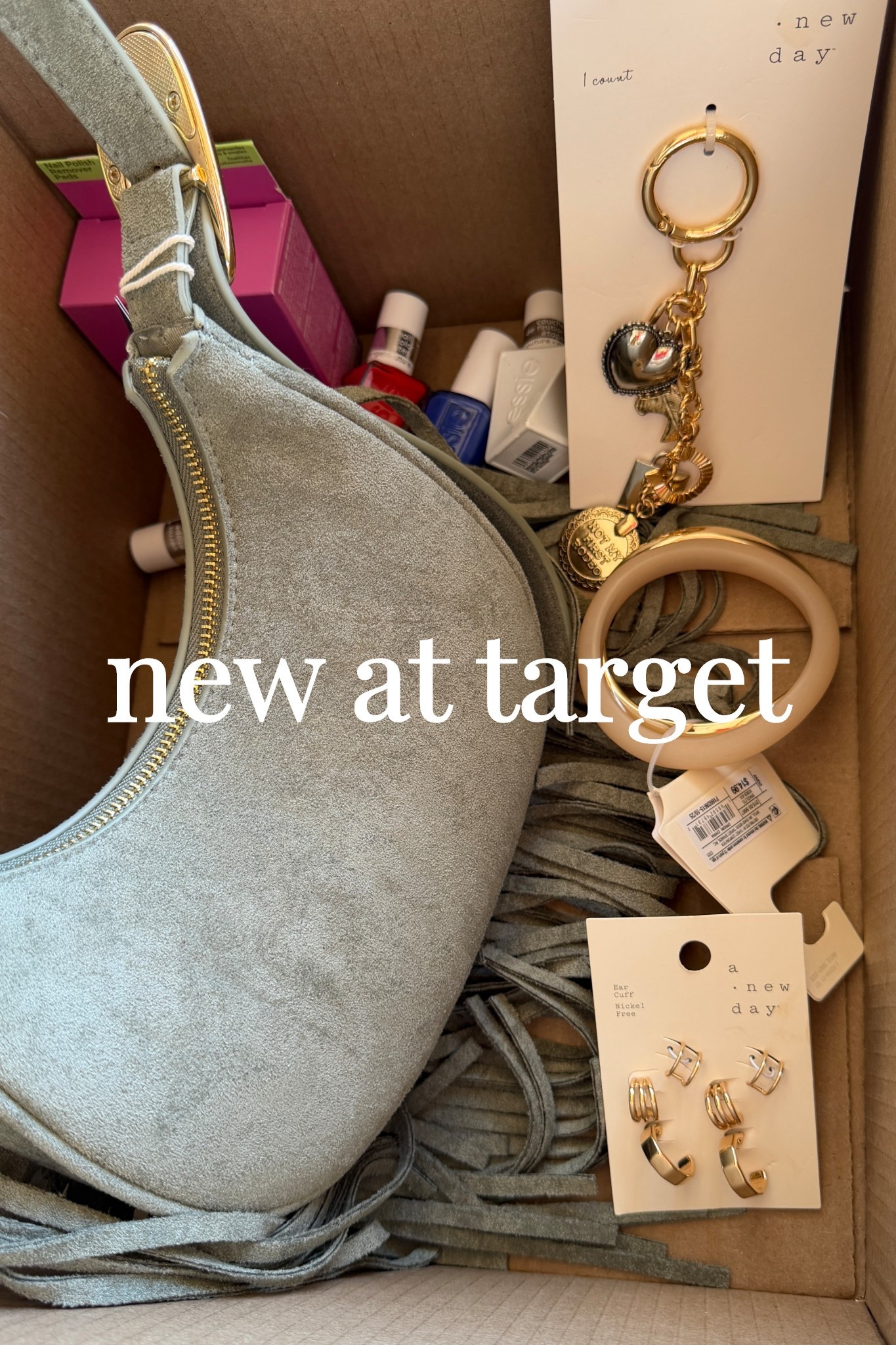 A few target finds that I’m taking to Nashville! Fringe purse, bag charm, gel nail polish, jewelry 

#LTKBeauty #LTKootd #LTKSpringSale