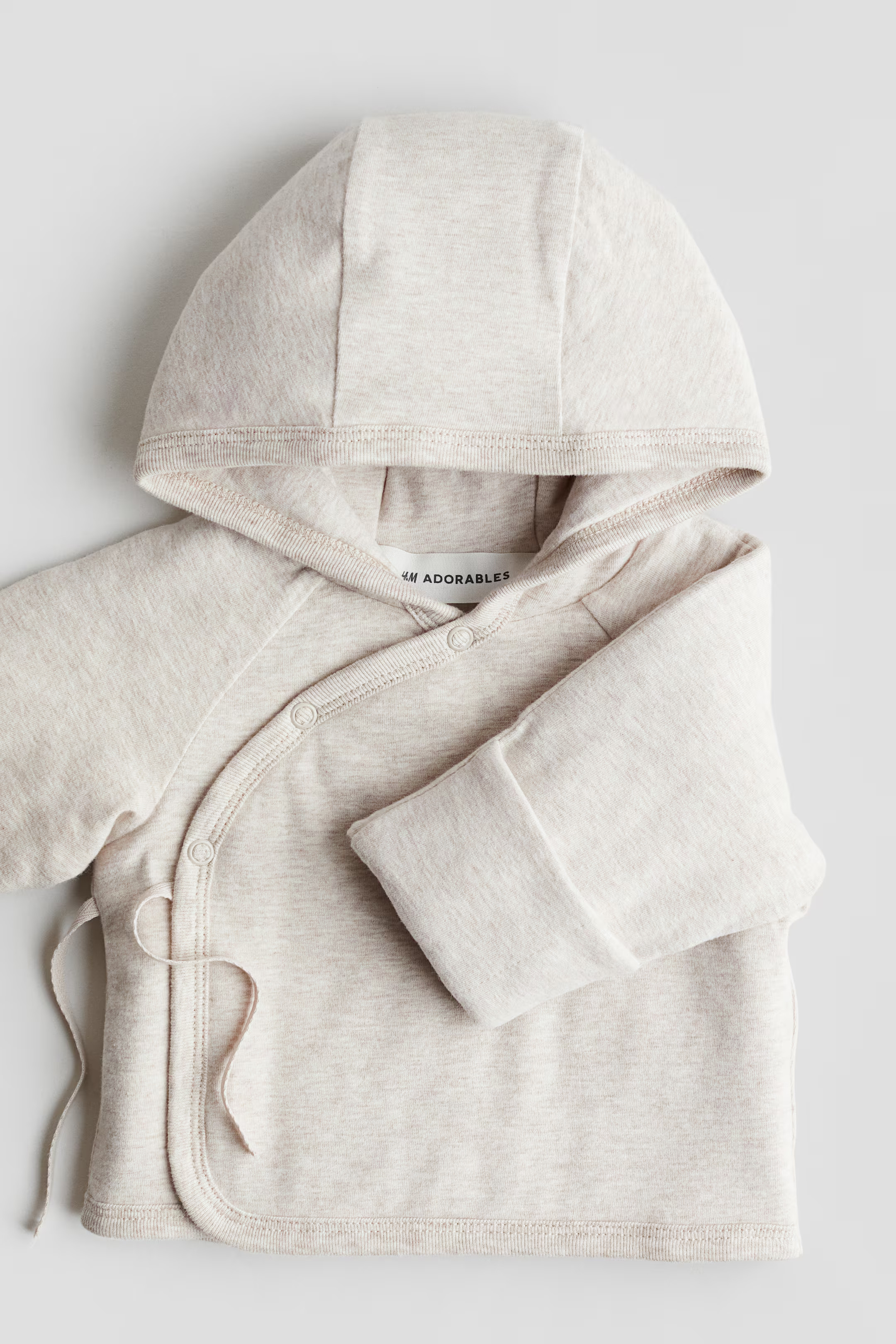 Padded jersey jacket - Long sleeve - Regular length - Light beige marl - Kids | H&M GB | H&M (UK, MY, IN, SG, PH, TW, HK)