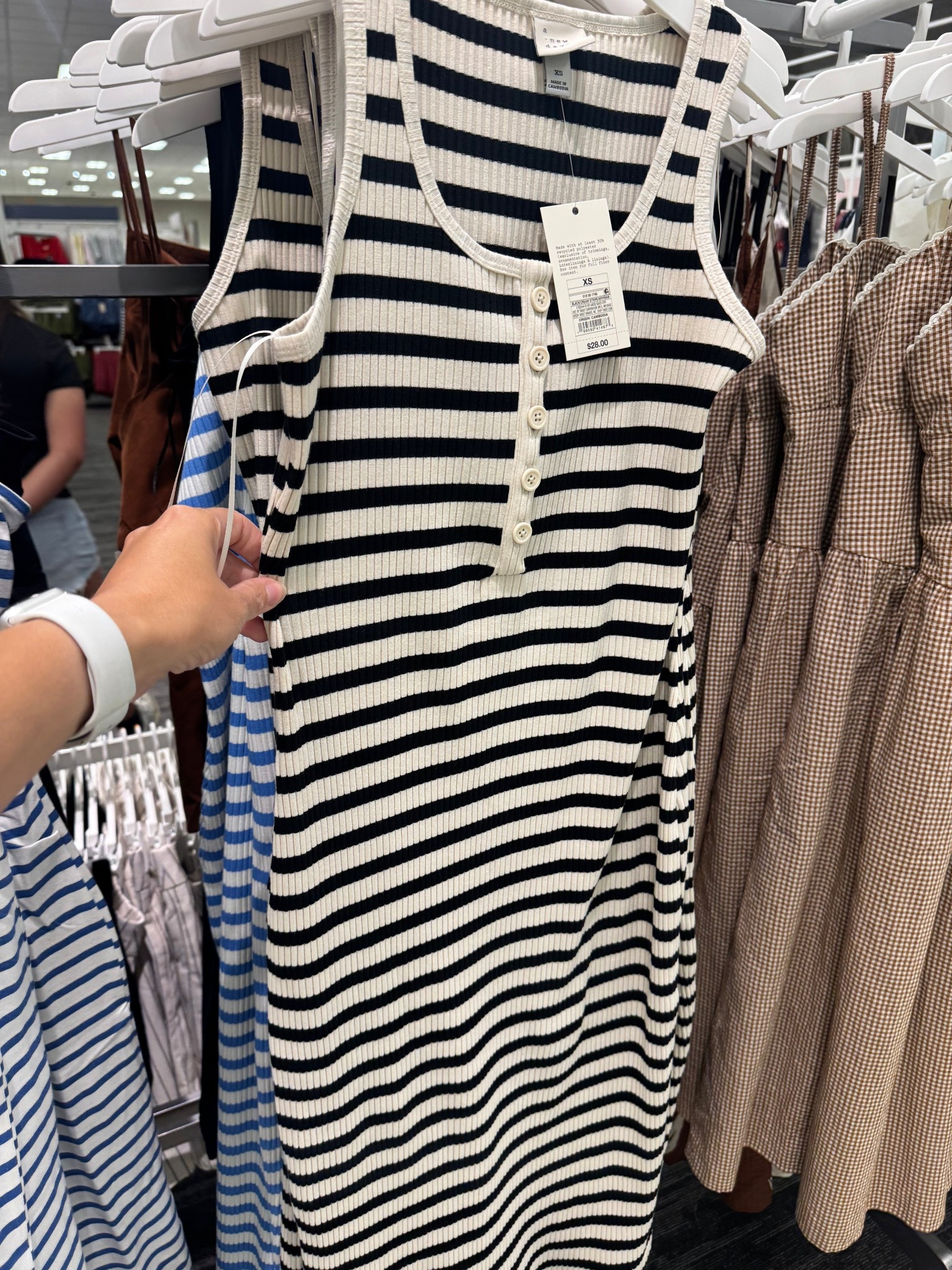 Target spring dress find 🤍

This wide strap button-front midi is such a good staple. It’s a soft bodycon fit but still really comfy and easy to wear. The cream/white stripes feel so fresh for spring, and the thicker straps are super flattering.

Also comes in blue and solid black if you want something more simple 👏🏼

Easy to dress up or keep casual—definitely a wear-on-repeat kind of piece ✨

#LTKmomlife #LTKOver40