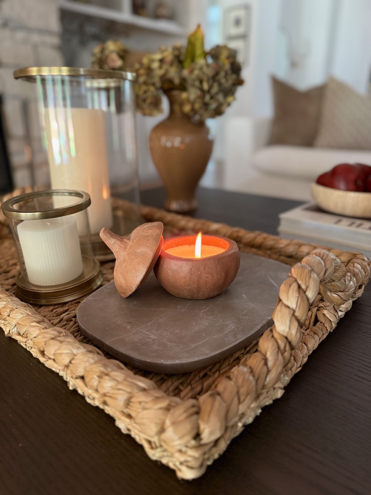Classic and cozy coffee table styling idea 🍂 Love this terracotta pumpkin candle!

#LTKHome #LTKSeasonal #LTKFindsUnder50