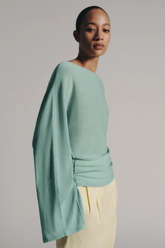Boat neck jumper. Long sleeves with slits and wide armholes. Featuring pronounced seam detailing ... | Zara US