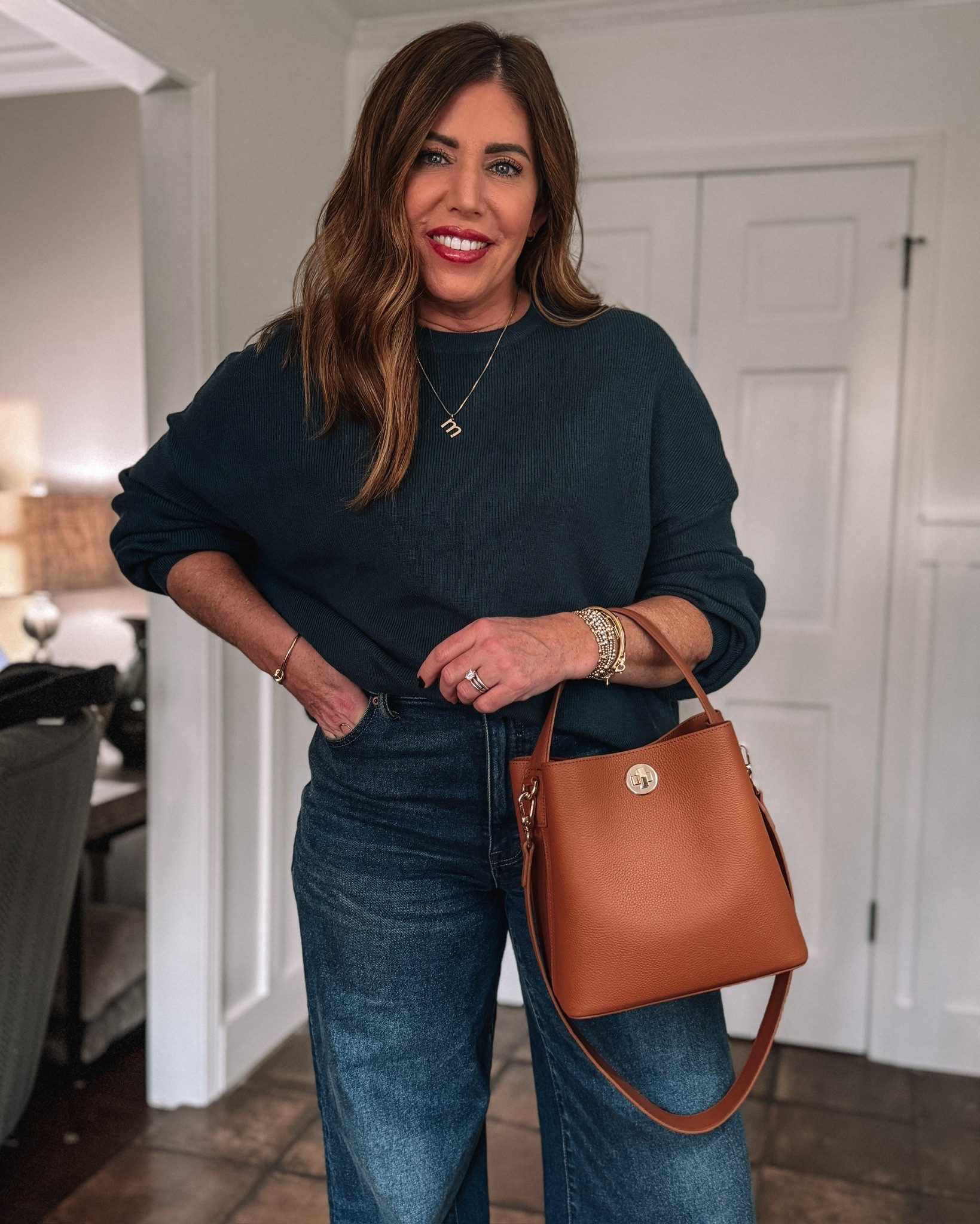 Love my new oversized sweater and leather bucket bag. Perfect for everyday errands and casual outings.

#LTKMidsize #LTKOver40 #LTKgrwm