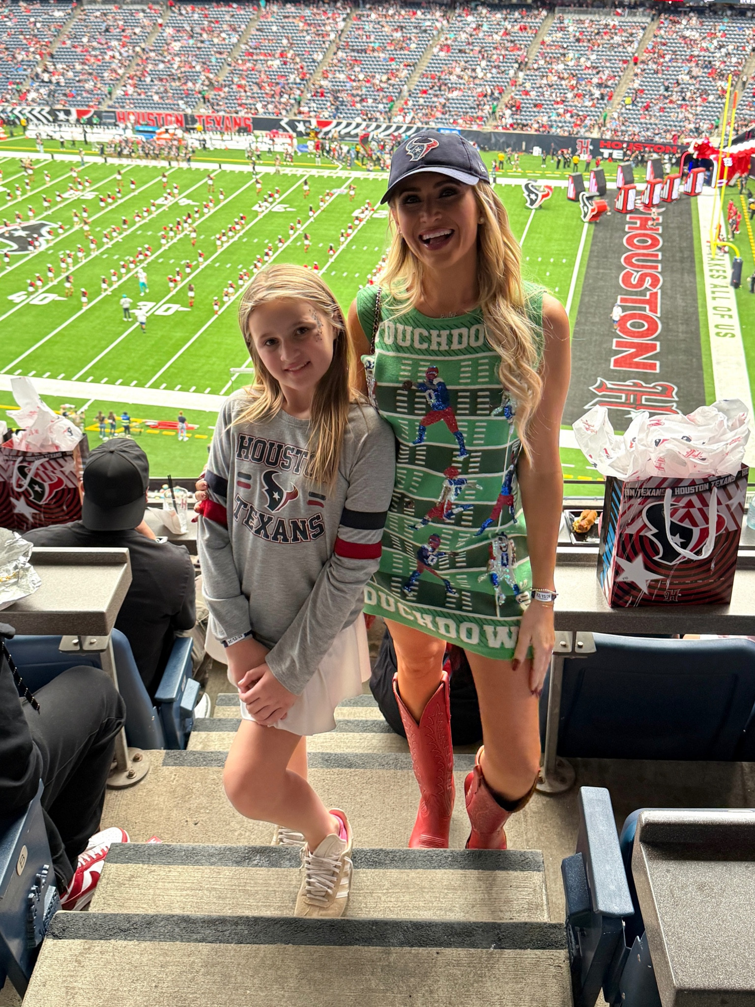 Texans Football game day at NRG Park wearing 

Queen of sparkles, city boots, houston Texans 