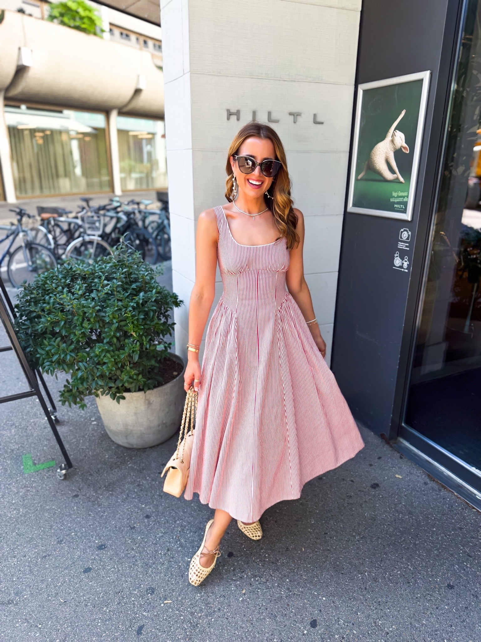 My Switzerland outfit of the day! Linen midi dress in XXS petite with adjustable straps and padding in the bust (no bra needed). Europe outfit. Summer outfit. Summer dress. Vacation outfit. Vacation dress. Resort outfit. Europe outfit. Woven ballet flats are TTS.

#LTKootd #LTKTravel #LTKPetite