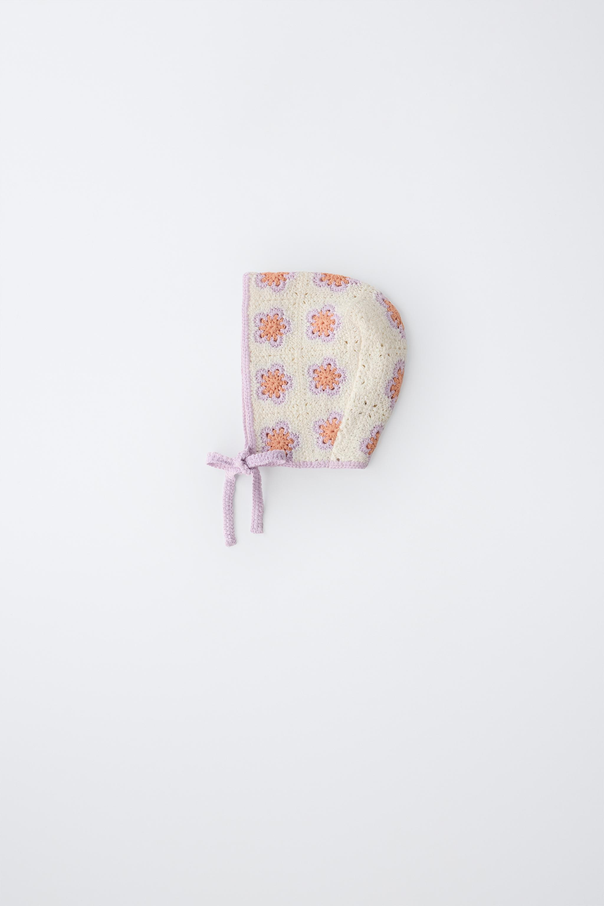 Knit bonnet with adjustable ties. Features crocheted flower detail. | Zara US