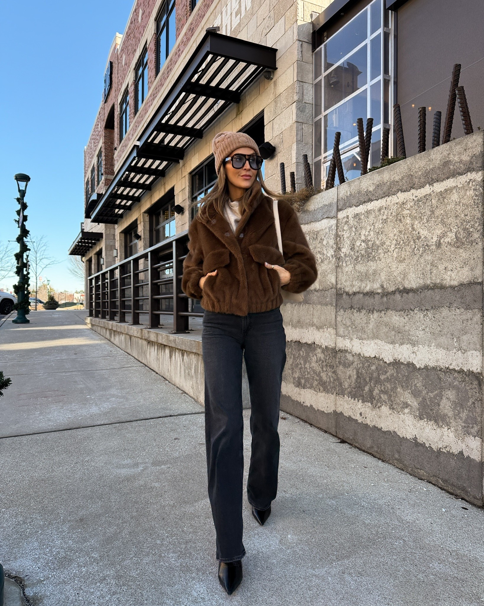 Sunday winter outfit in black jeans, faux fur bomber jacket, scarf sweater, beanie, and black booties!

#LTKTravel #LTKdayinmylife #LTKootd