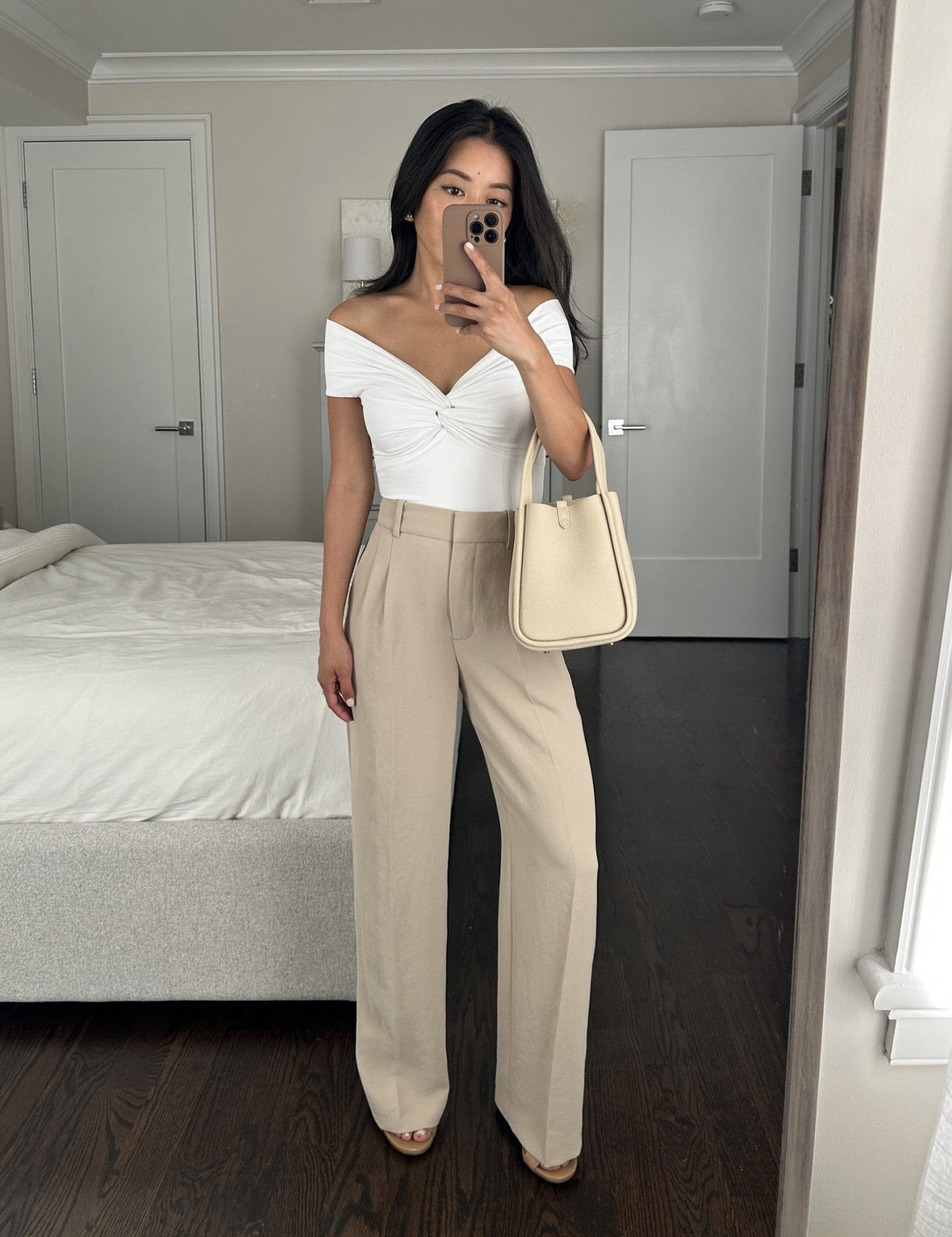 Rare Aritzia happening today! See more on my latest blog post (extrapetite.com) and just FYI sale items are returned for store credit only 

• Off the shoulder twist top xxs - snug fit on me. I have a reformation version of this but the Aritzia one starts in smaller sizing for a better fit!

• Effortless pants full length in short - 28.5” inseam, these also come in a cropped version that I prefer for versatility . Elegant crepe draping fabric and no elastic back waist. I have on 3 inch heels .

Effortless pants in size 00 fits a 24” waist, size 0 fits a 25/25.5” waist 

The shorts linked also fit well for petites 

• Songmont bag

#petite friendly Aritzia sale finds 

#LTKsalealert #LTKSeasonal #LTKworkwear