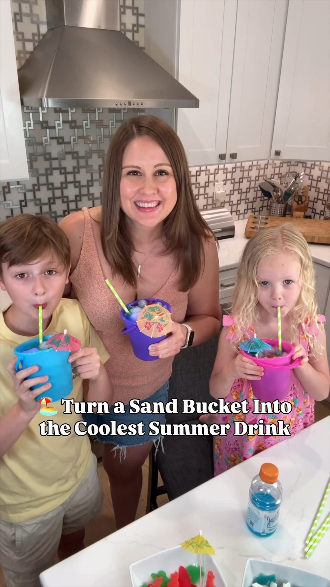 🏖️🦈 These beach bucket mocktails are the summer drink everyone is going to be talking about! ✨

Fill mini sand buckets with your favorite zero-sugar drink, then add shark gummies, sea life gummies, a glowing ice cube, a tiny umbrella, and a sprinkle of edible glitter for that sparkling ocean effect. 🌊💙

Want to take them up a notch? Toss in frozen strawberries or pineapple for an extra refreshing treat! 🍓🍍

Perfect for pool parties, beach days, birthday parties, movie nights, or anytime you want to bring a little vacation magic home. ☀️

Save this fun idea for summer and grab everything you need right here! 💙

#LTKFamily #SummerPartyIdeas #MocktailRecipes #BeachParty #SummerDrinks #PoolPartyIdeas #FamilyFun #SummerEntertaining
