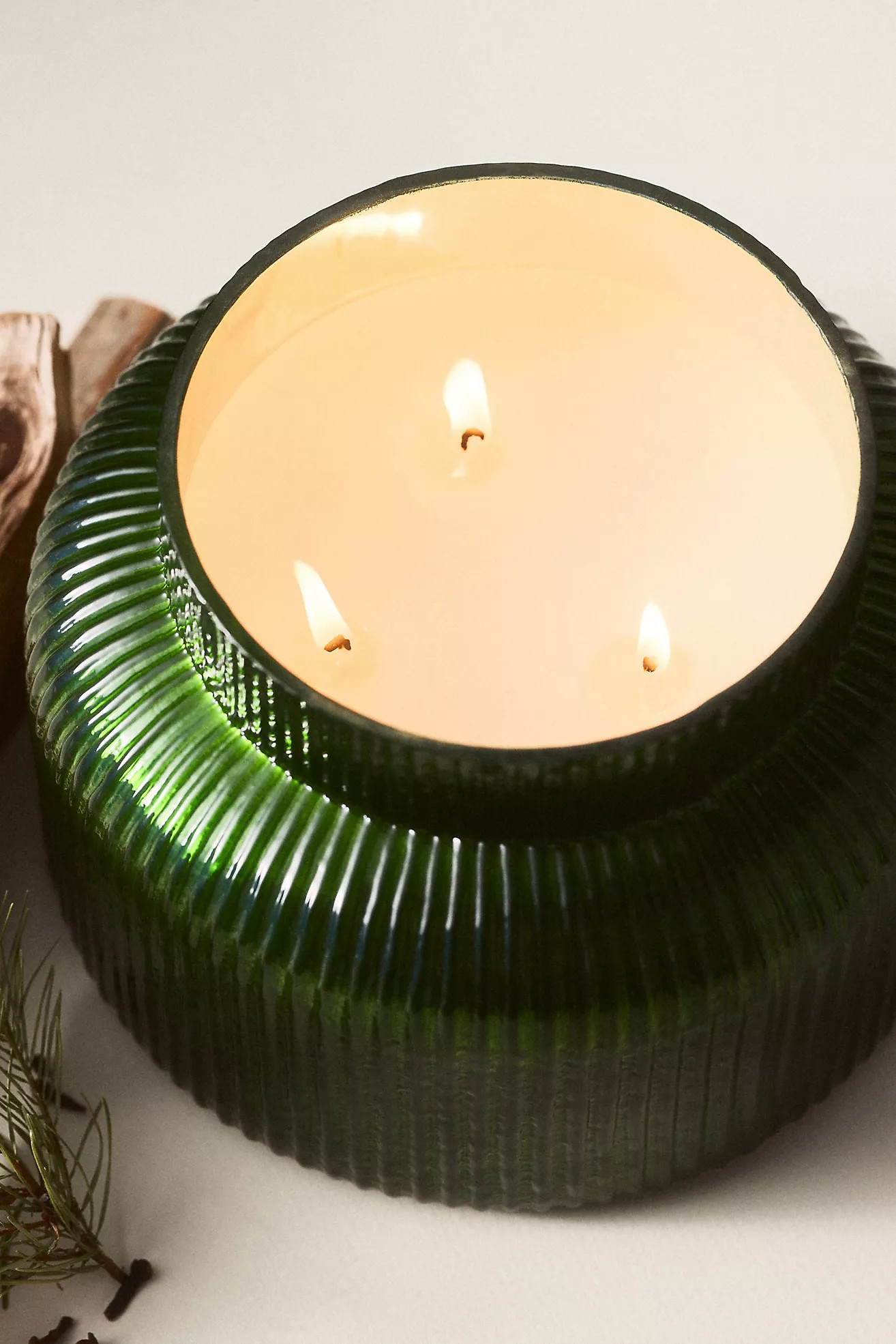 Capri Blue Woody Fir & Firewood Glass Candle | Anthropologie (US)