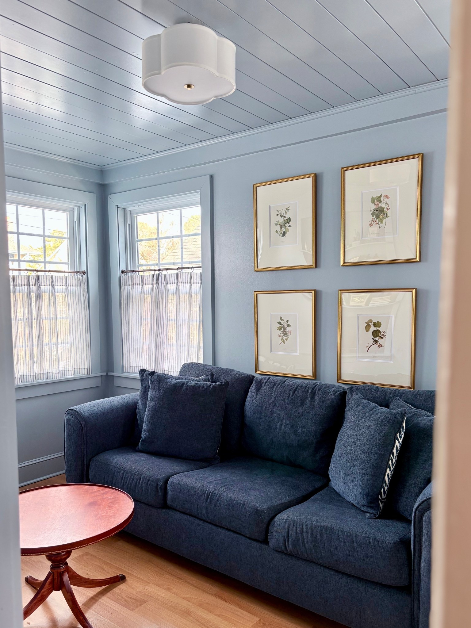 Our little blue room - 

Wall color is Benjamin Moore Little Falls

Coffee table is a fb marketplace find 