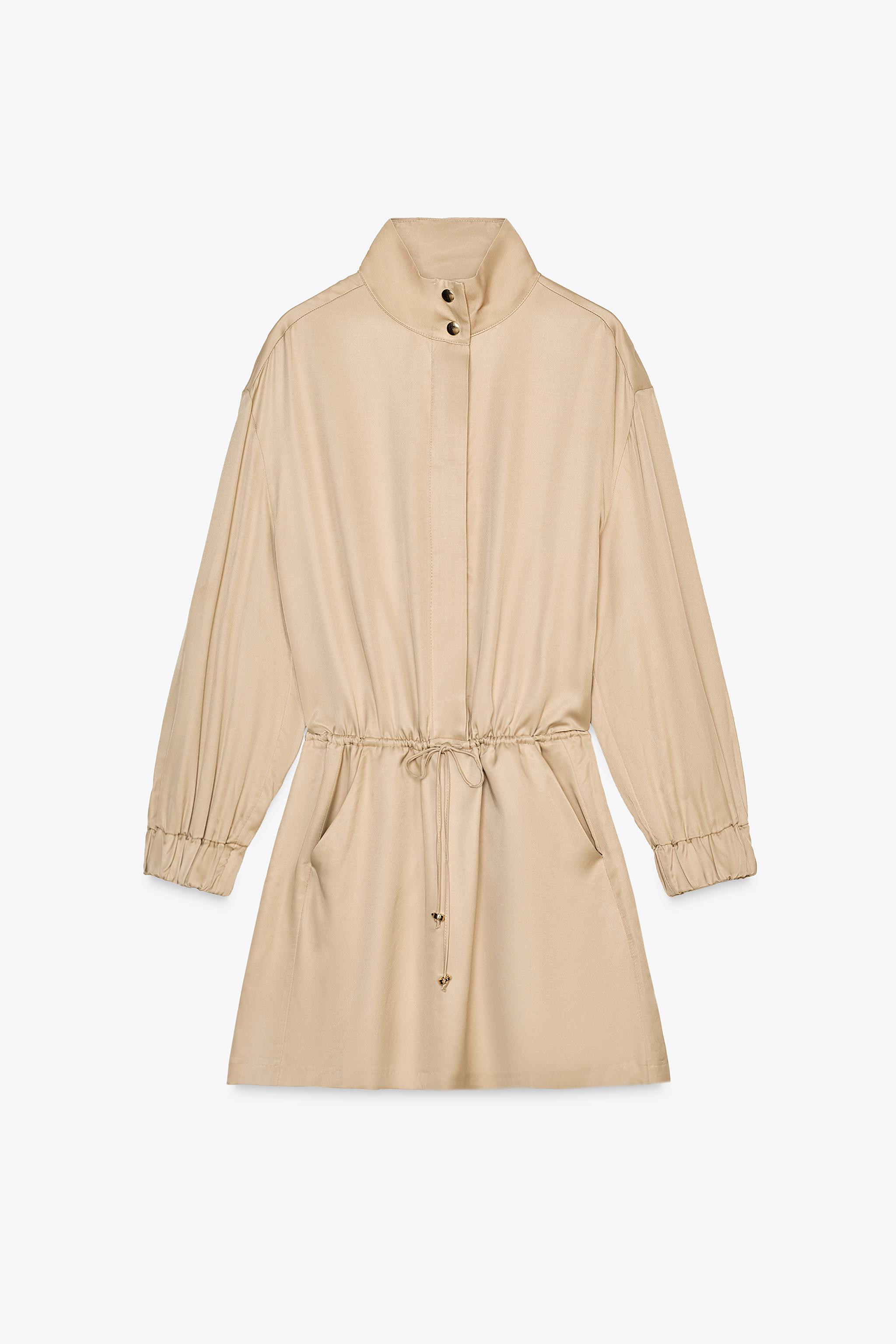 High-neck dress with long sleeves and elastic cuffs. Adjustable drawstring waist. Front pockets. ... | Zara US