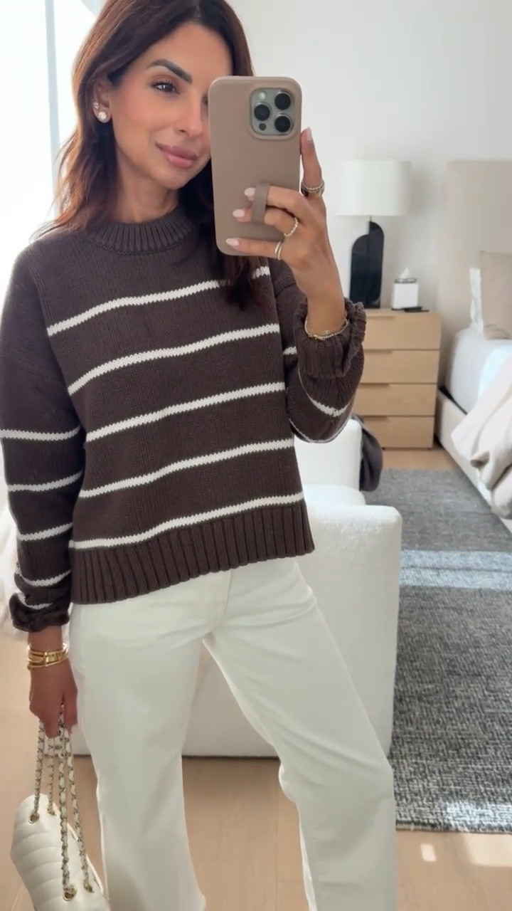 This brown striped sweater is under $50 and comes in 3 other colors! 🤎 A great spring transitional piece. So cozy and easy to style with white pants and sneakers!

#LTKfindsunder50 #LTKstyletip 

#LTKSeasonal