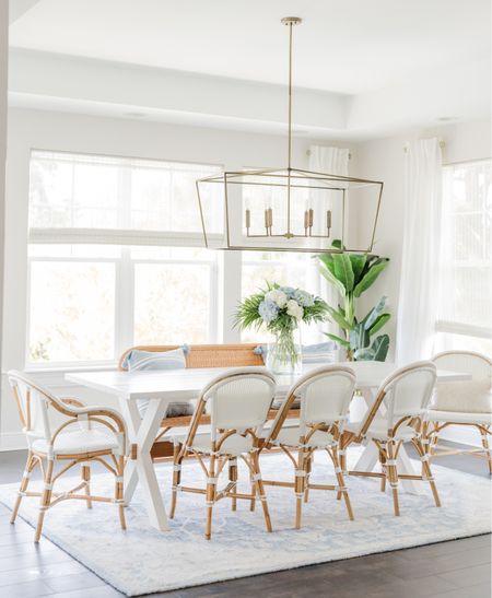 Light and airy dining space design. 

With seven children, I need things to be easy ti clean and family friend. We can fit several kids on that bench and we swap out inexpensive washable rugs. 

@serenaandlily #serenaandlily 

#LTKover40 #LTKstyletip #LTKhome