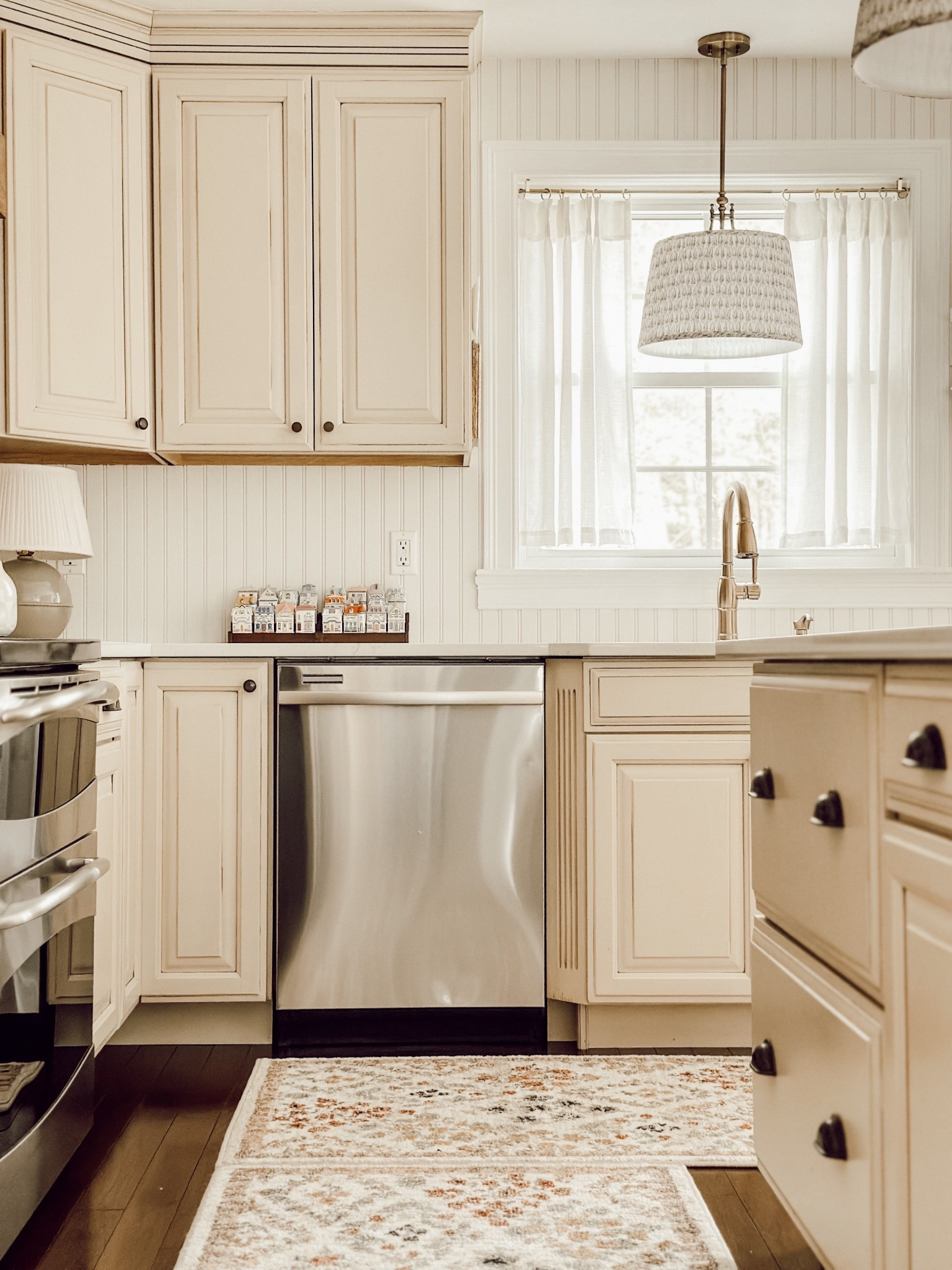Here’s more of a wider view of the spice village on the spice rack, on the kitchen counter. I love it!

#LTKHome #LTKStyleTip
