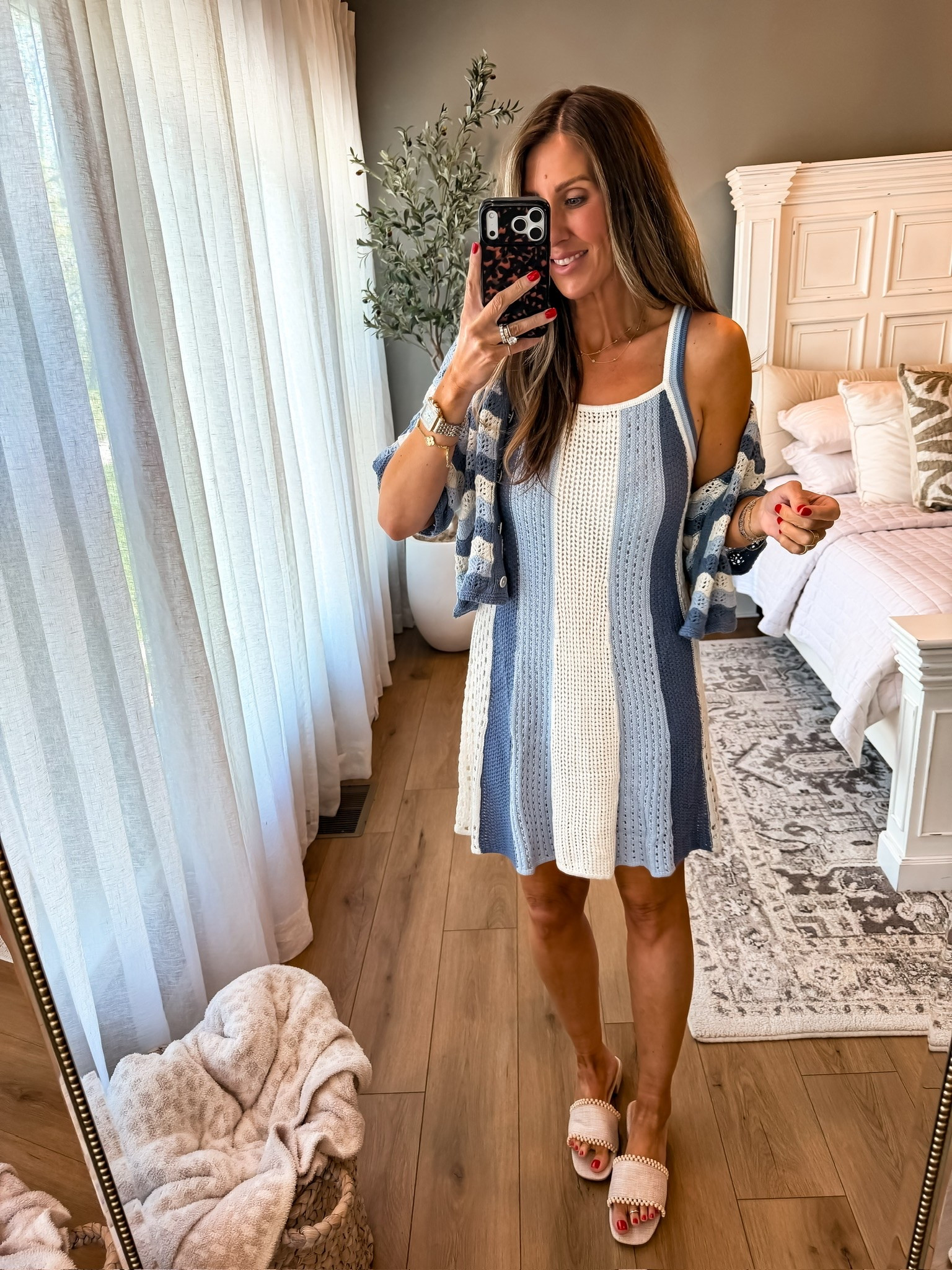 This knit cover up set is giving coastal vacation energy in the best way. The striped knit dress is lightweight and easy to throw on, and the matching cardigan makes it perfect for breezy beach days, poolside dinners, or summer getaways.

Knit dress, beach vacation outfit, coastal style, resort wear, striped dress, matching cardigan, vacation fashion, summer outfit idea, poolside look, beach cover up, travel style, seaside fashion, themominstyle

#LTKSeasonal #LTKTravel #LTKOver40